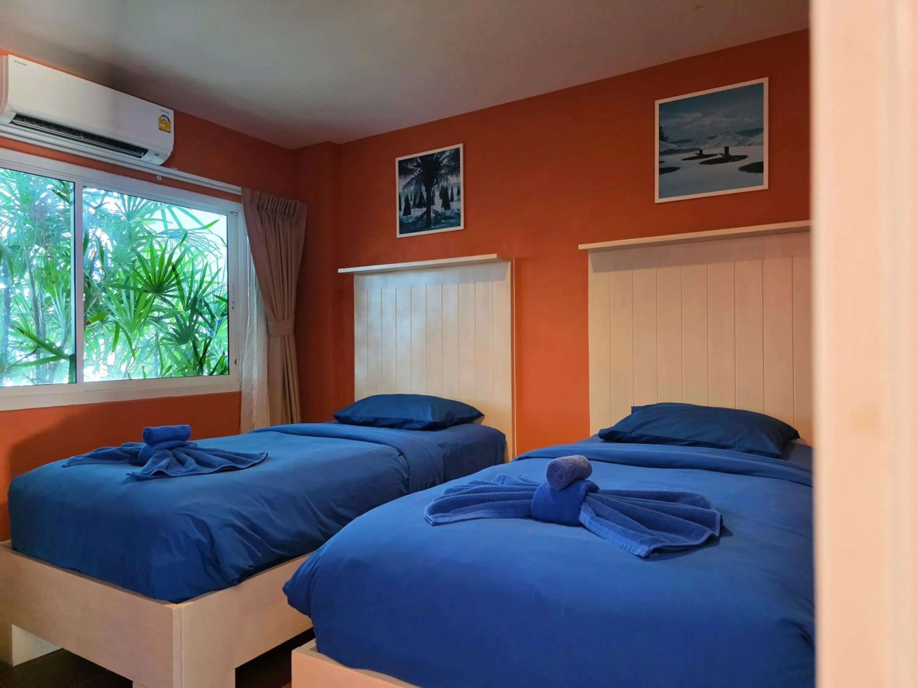 Bed in GrandBlue Resort & Beachclub