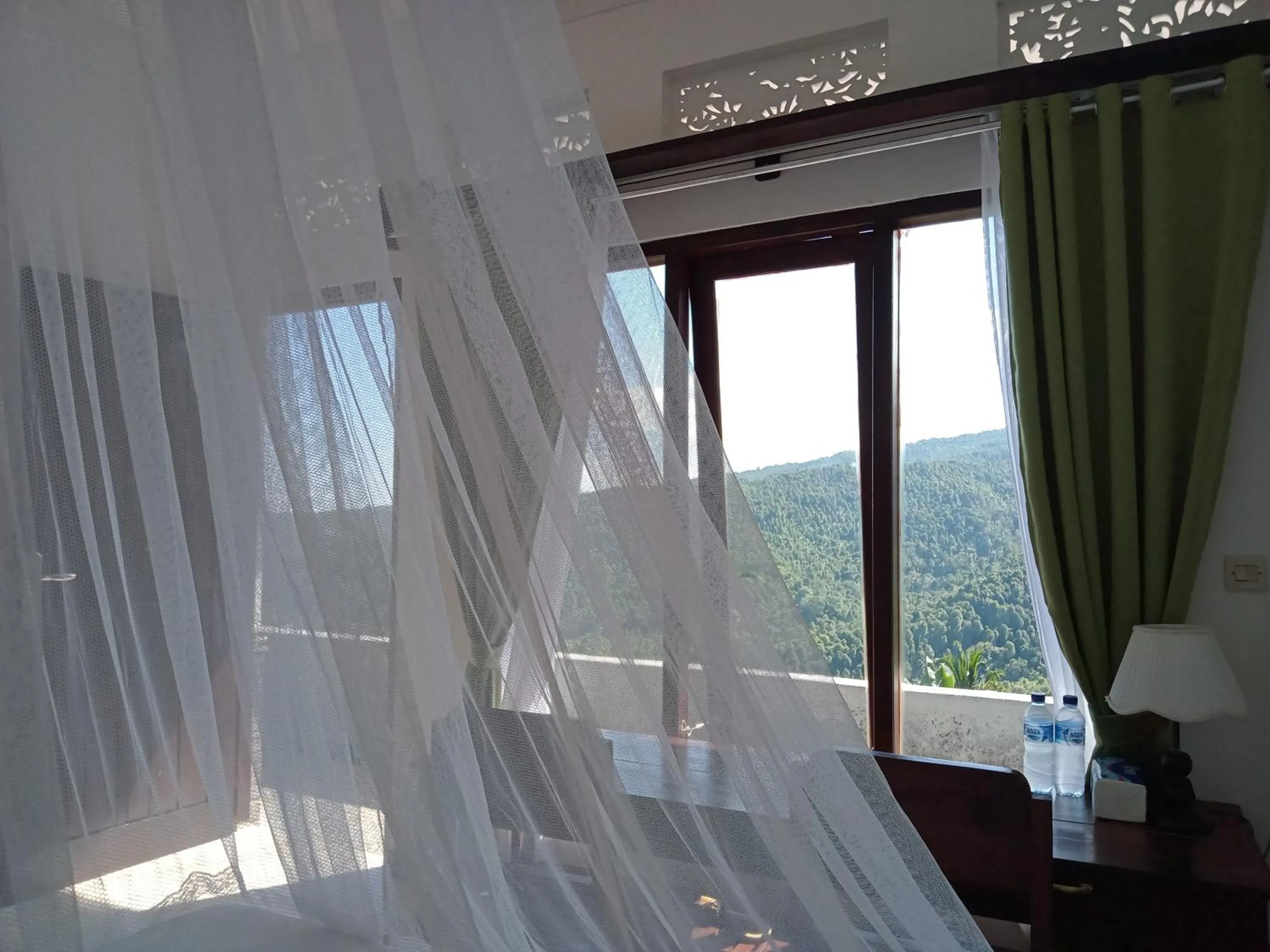 Bed in Aris Homestay and Warung Made