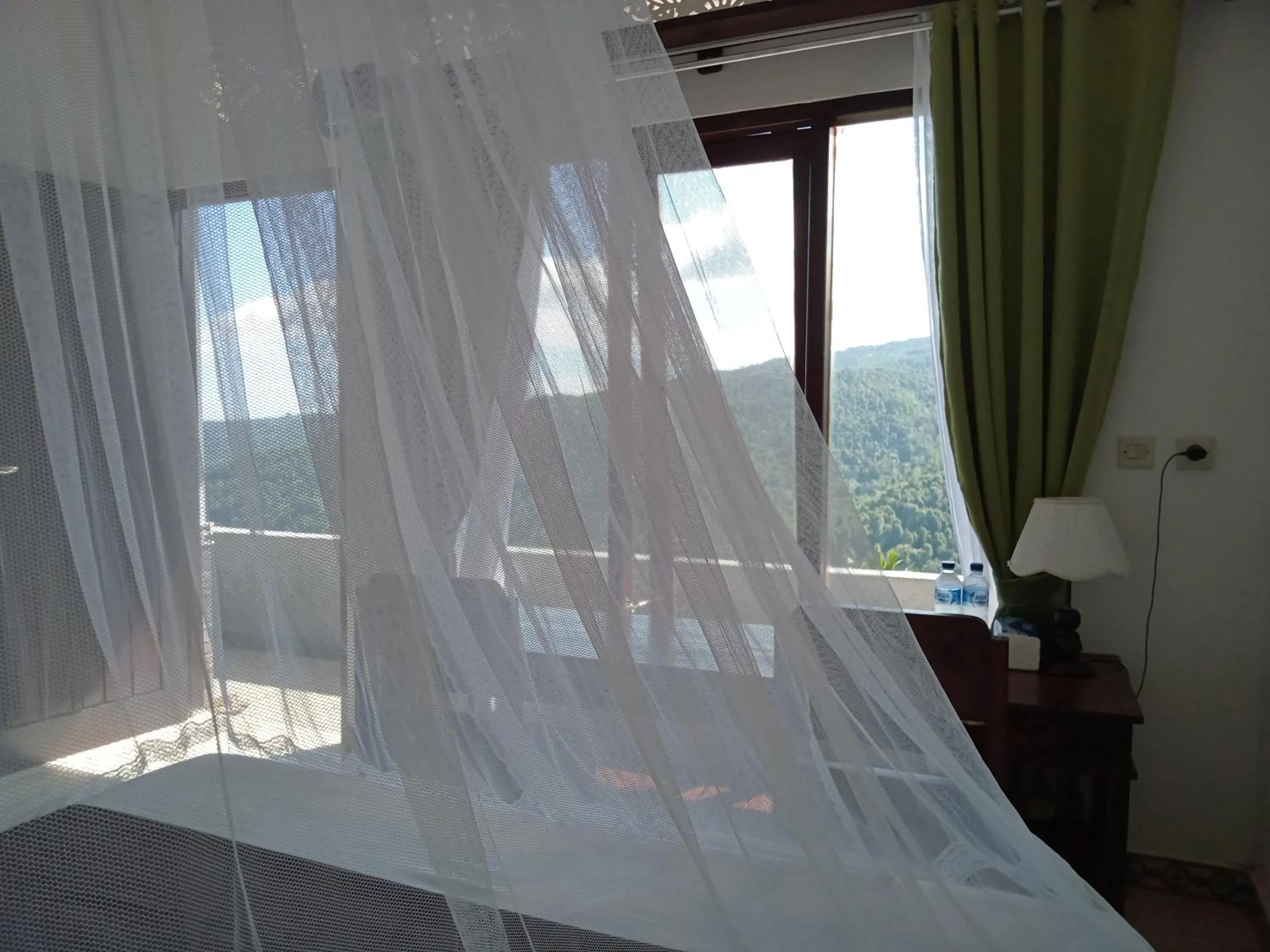 Bed in Aris Homestay and Warung Made