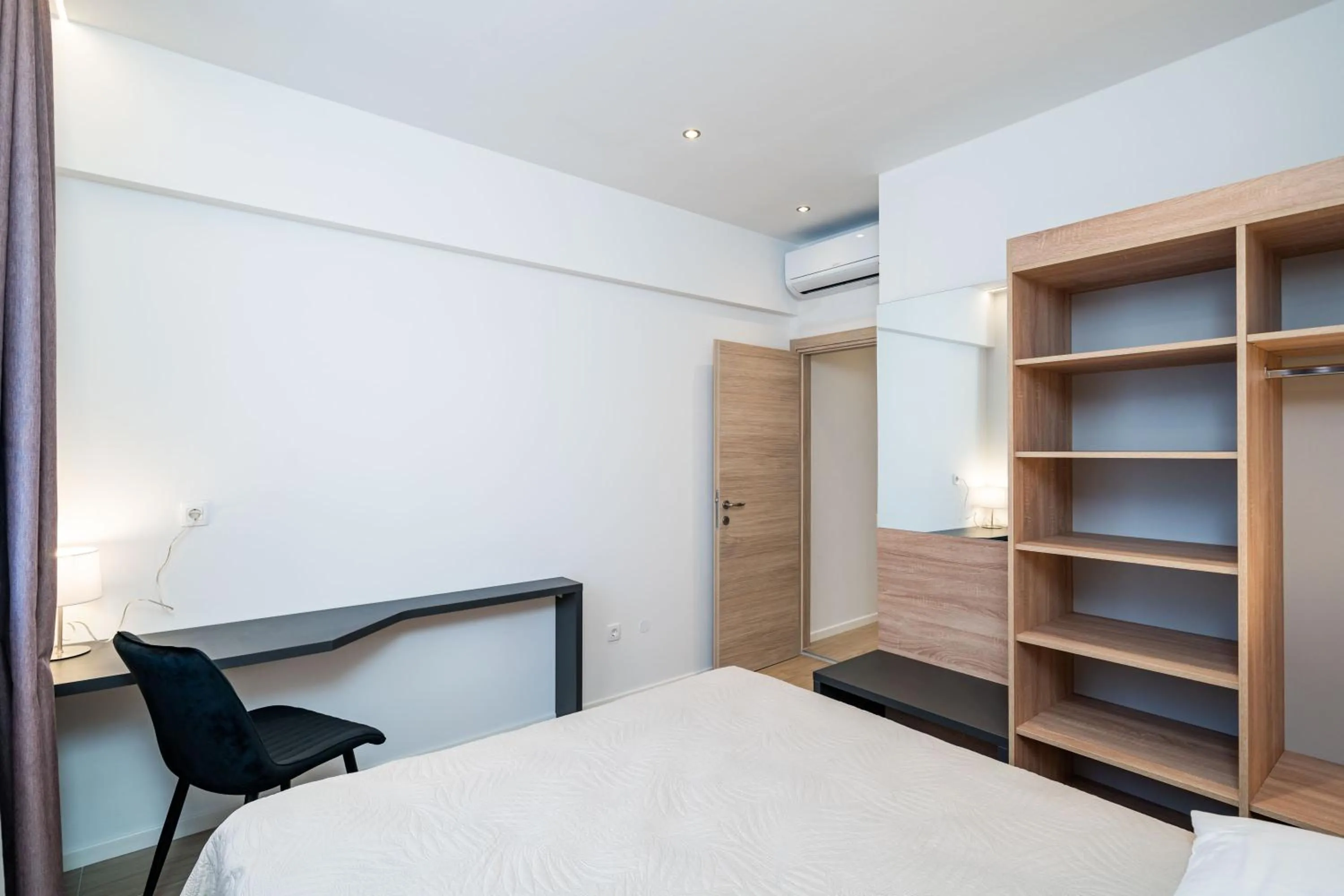 wardrobe, Bed in Bacan Serviced Apartments
