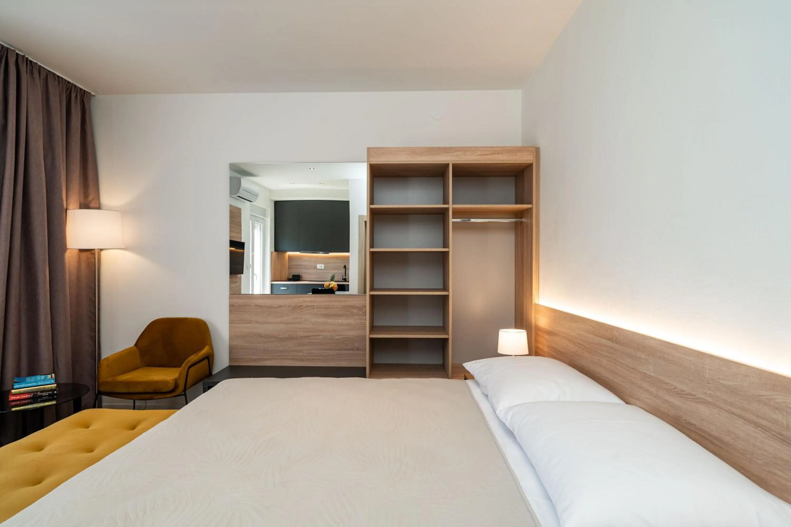 wardrobe, Bed in Bacan Serviced Apartments