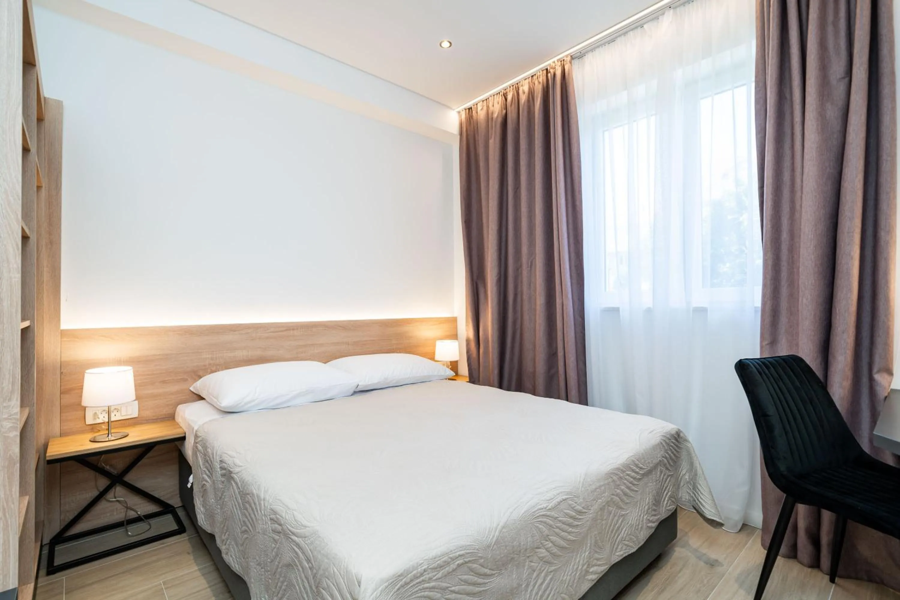 Bed in Bacan Serviced Apartments