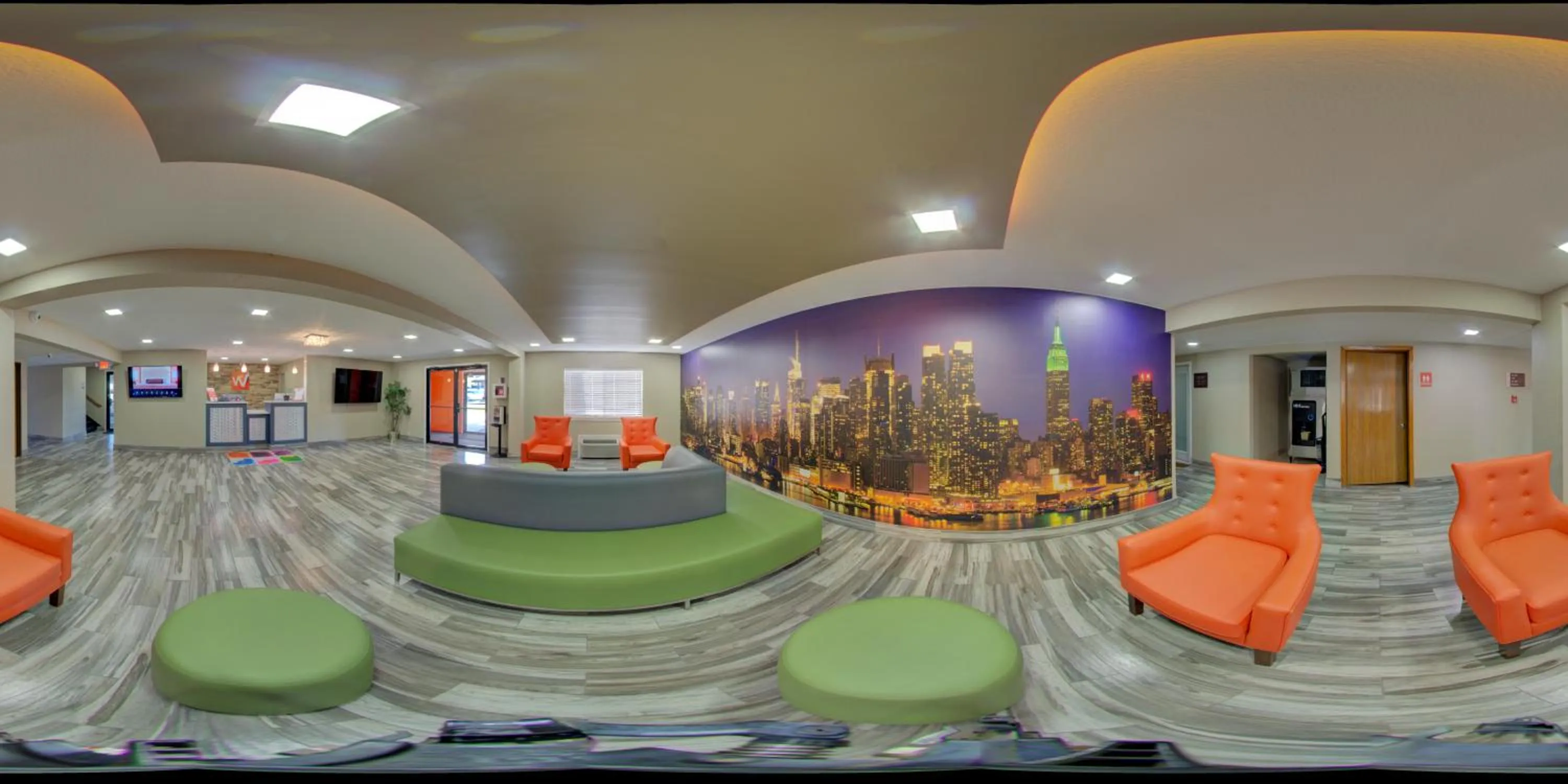 Communal lounge/ TV room in Westbridge Inn and Suites