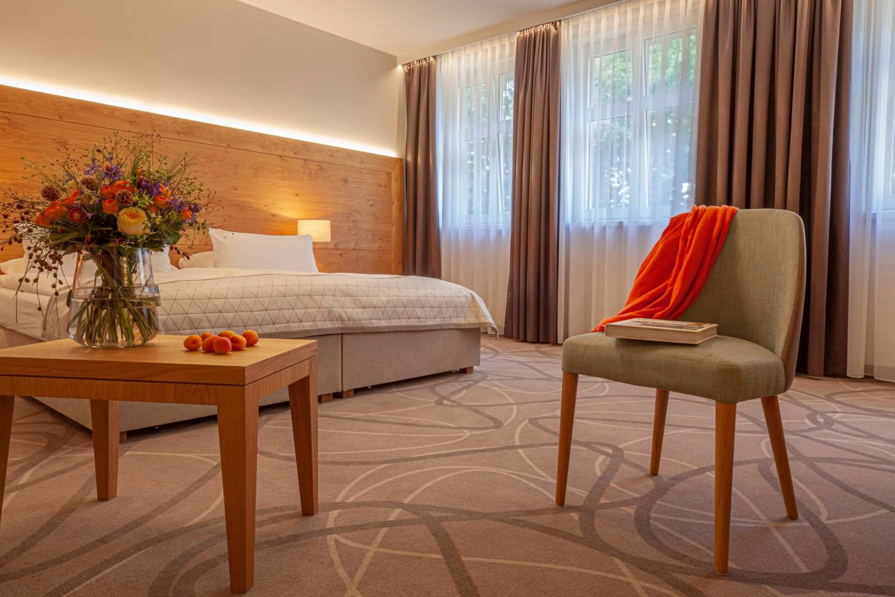 Seating area, Bed in Gasthof Zufriedenheit