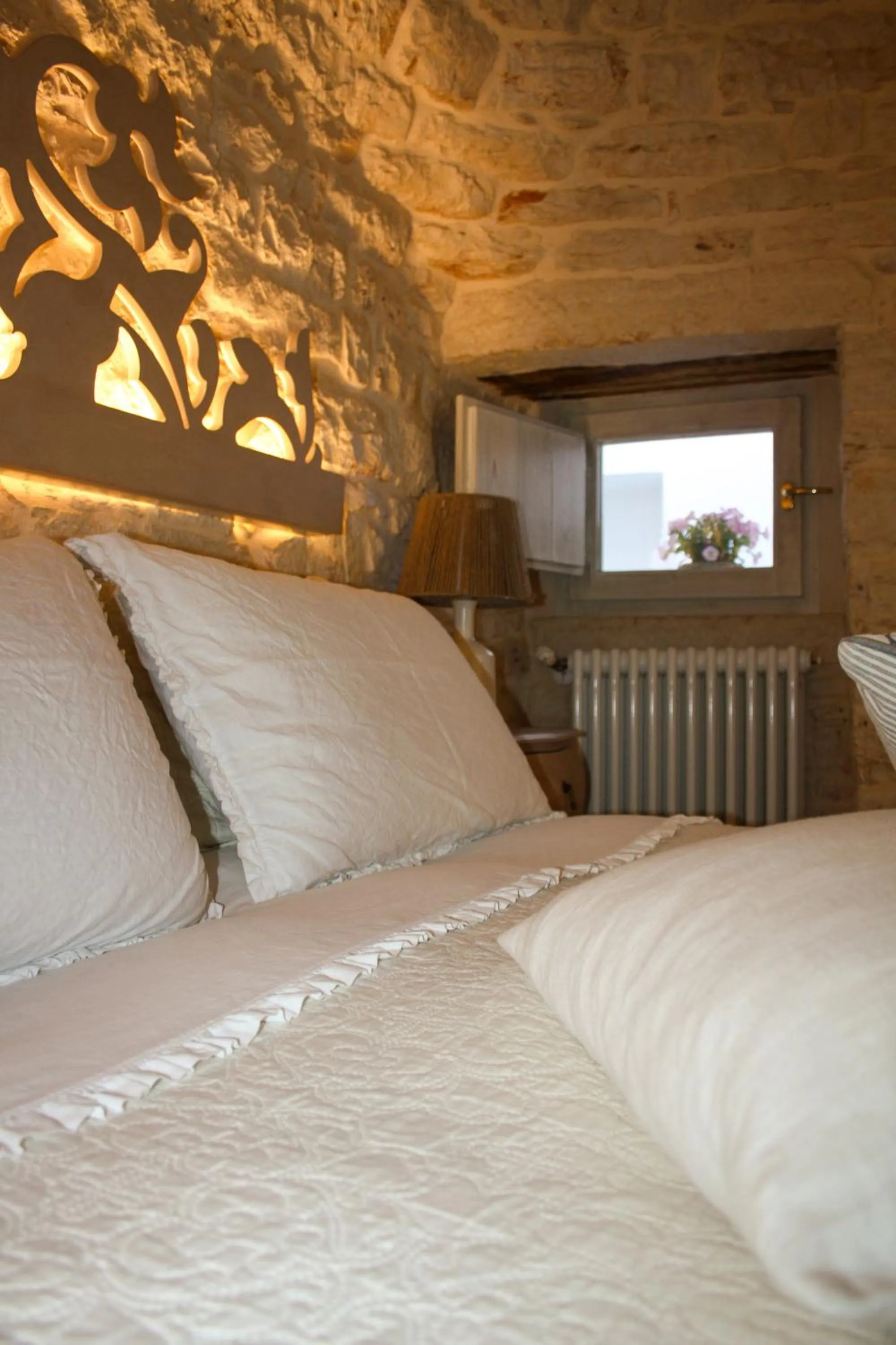 Bed in EnjoyTrulli - Unesco Site