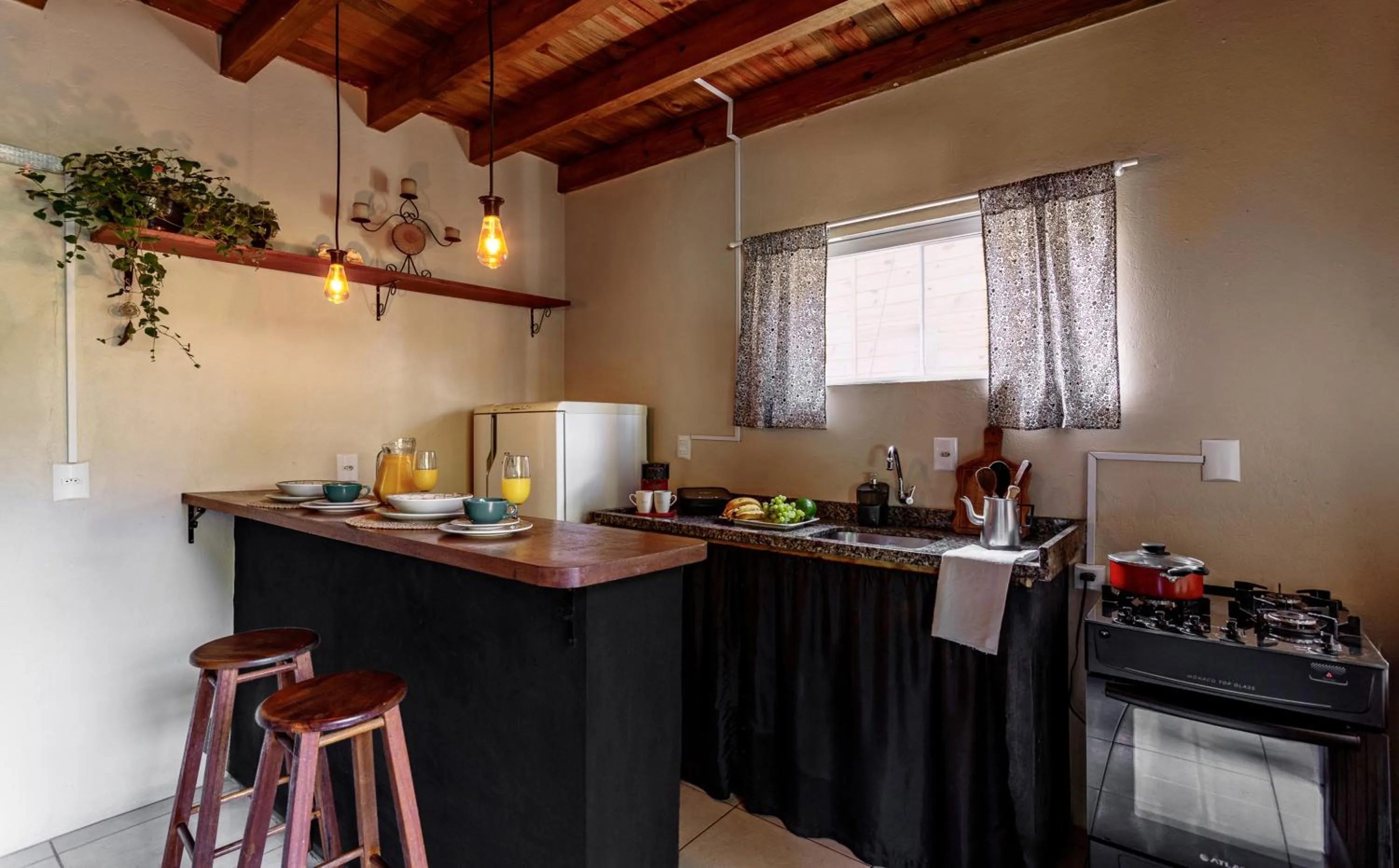 Kitchen or kitchenette in Moradas do Vale Praia do Rosa