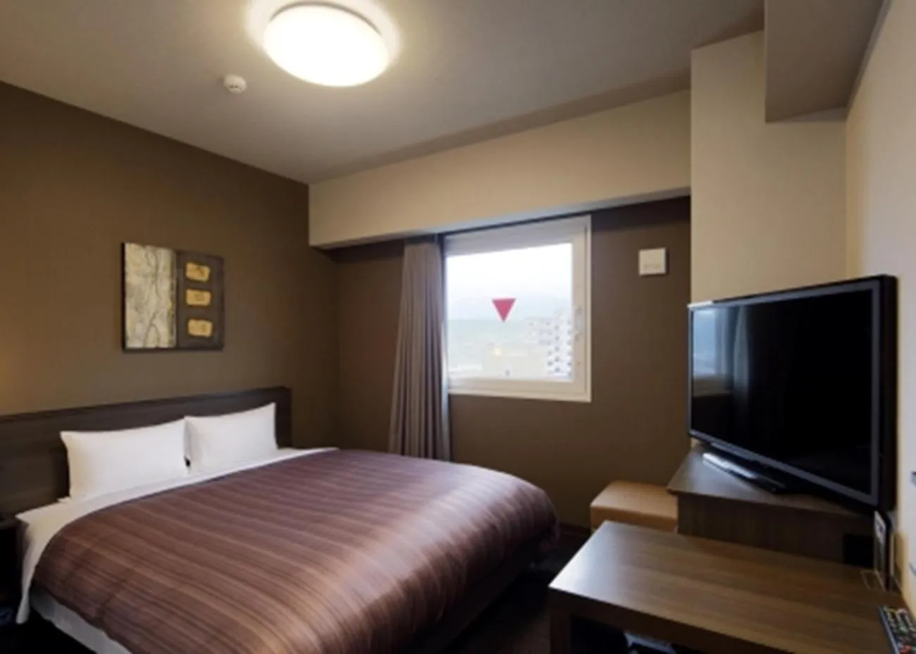 Photo of the whole room, Bed in Hotel Route-Inn Hita Ekimae