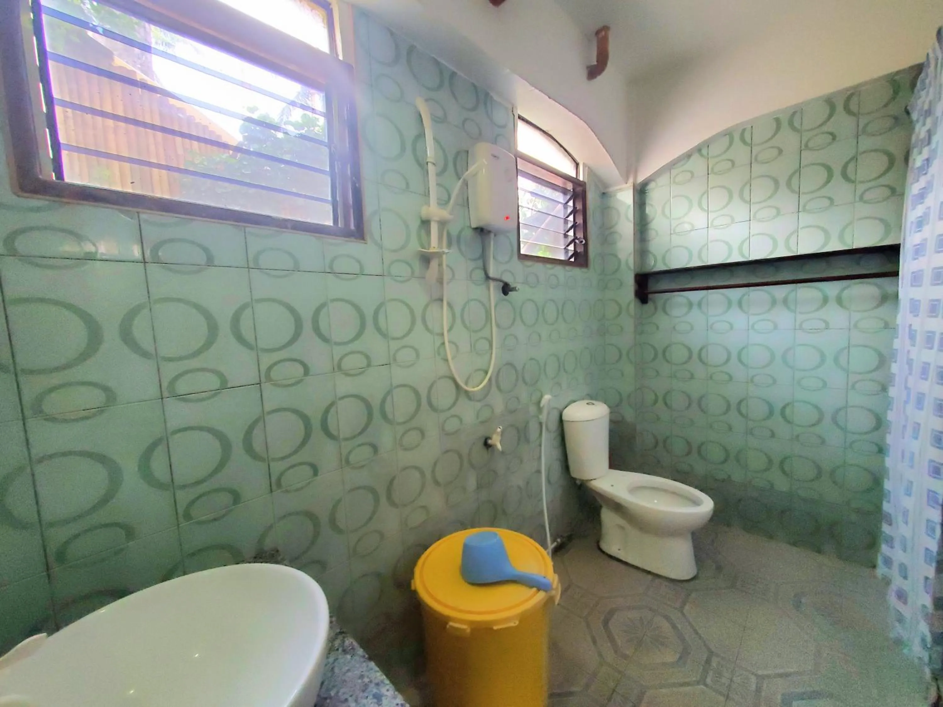 Bathroom in Patrick's on the Beach Resort