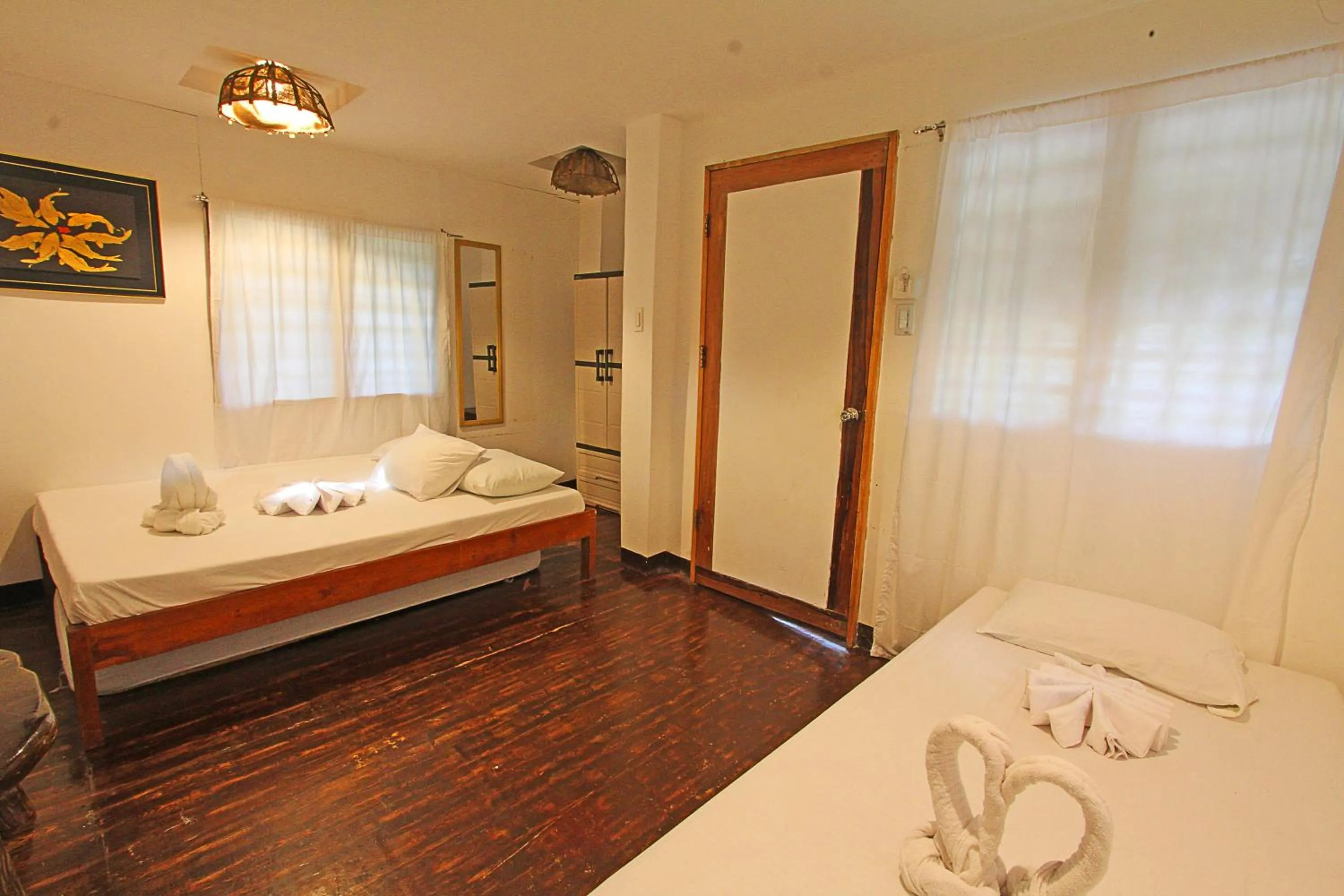 Bedroom, Bed in Patrick's on the Beach Resort