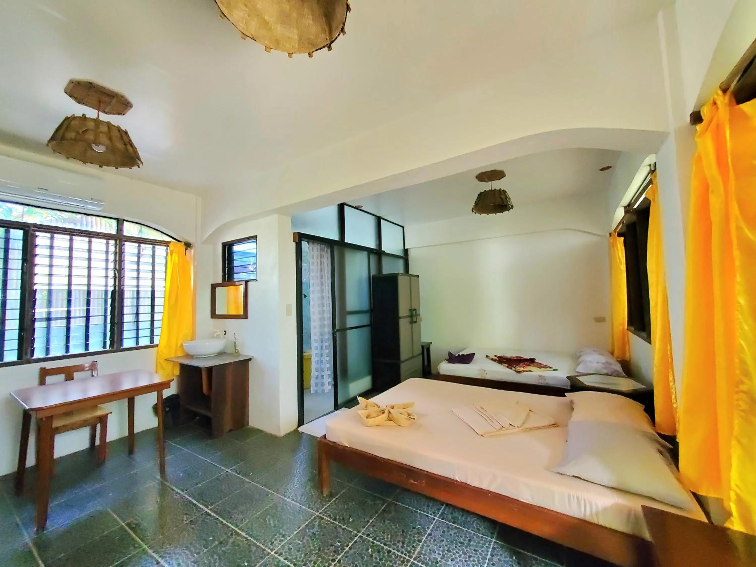 Bathroom, Bed in Patrick's on the Beach Resort