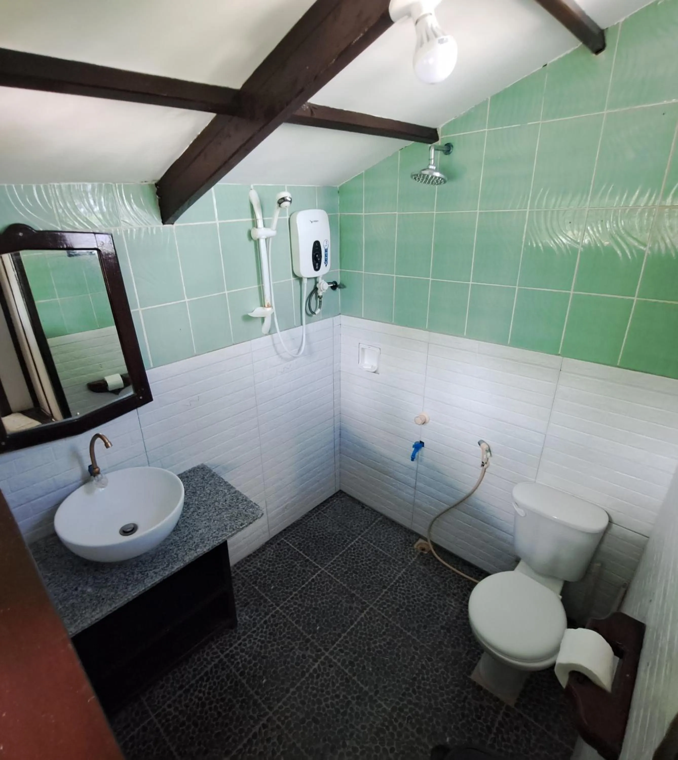 Bathroom in Patrick's on the Beach Resort