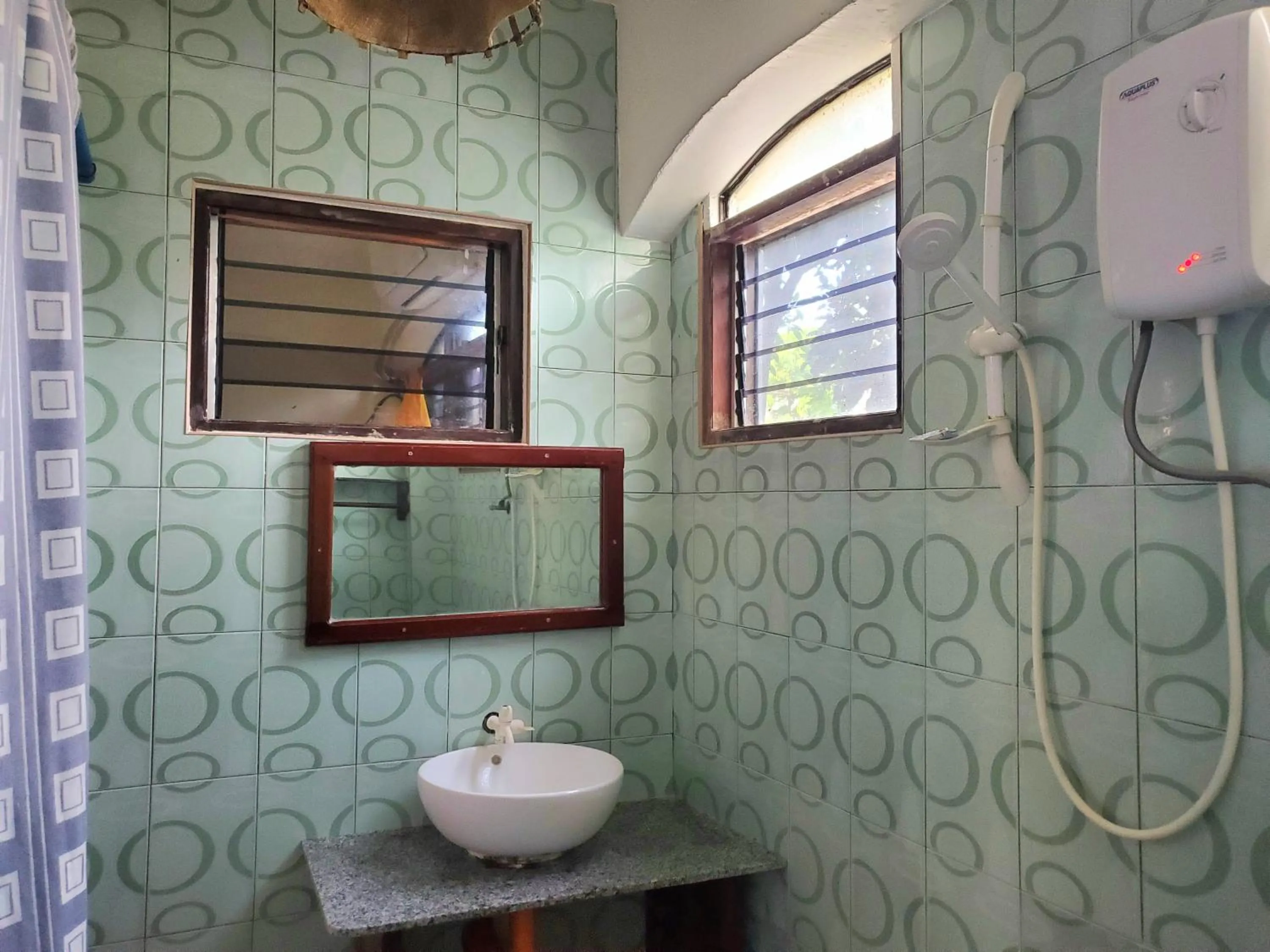 Bathroom in Patrick's on the Beach Resort