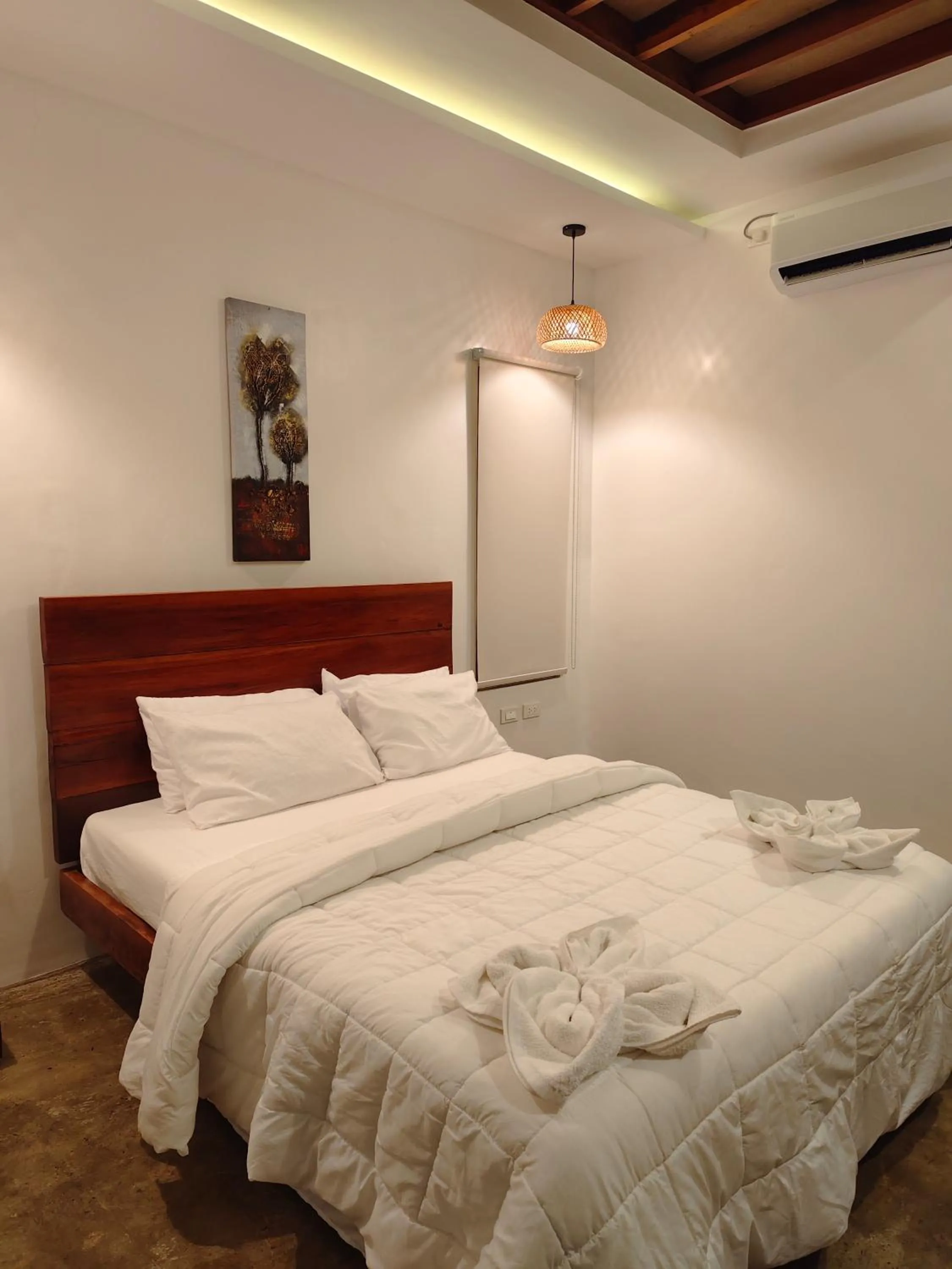 Photo of the whole room, Bed in Patrick's on the Beach Resort