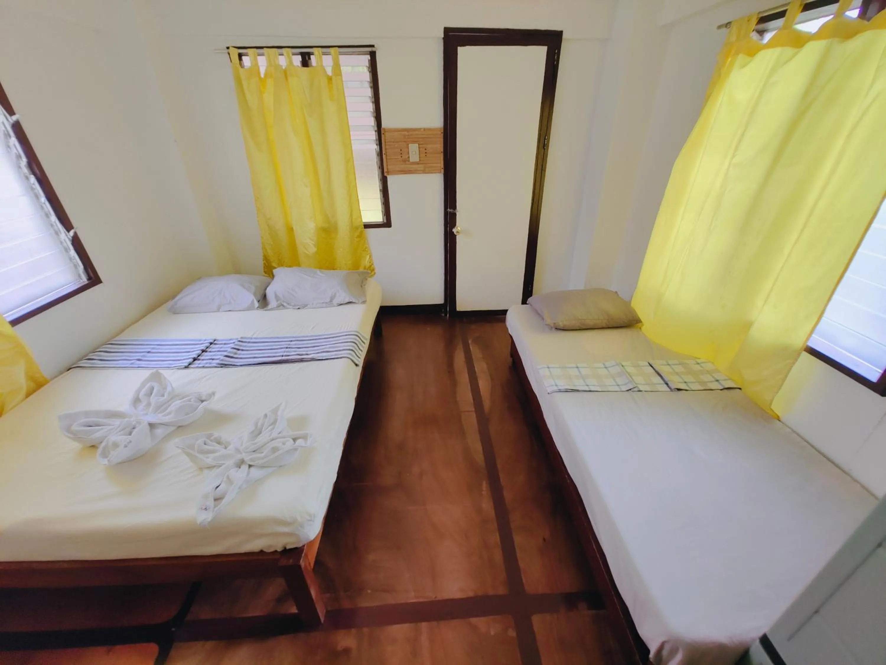 Bedroom, Bed in Patrick's on the Beach Resort