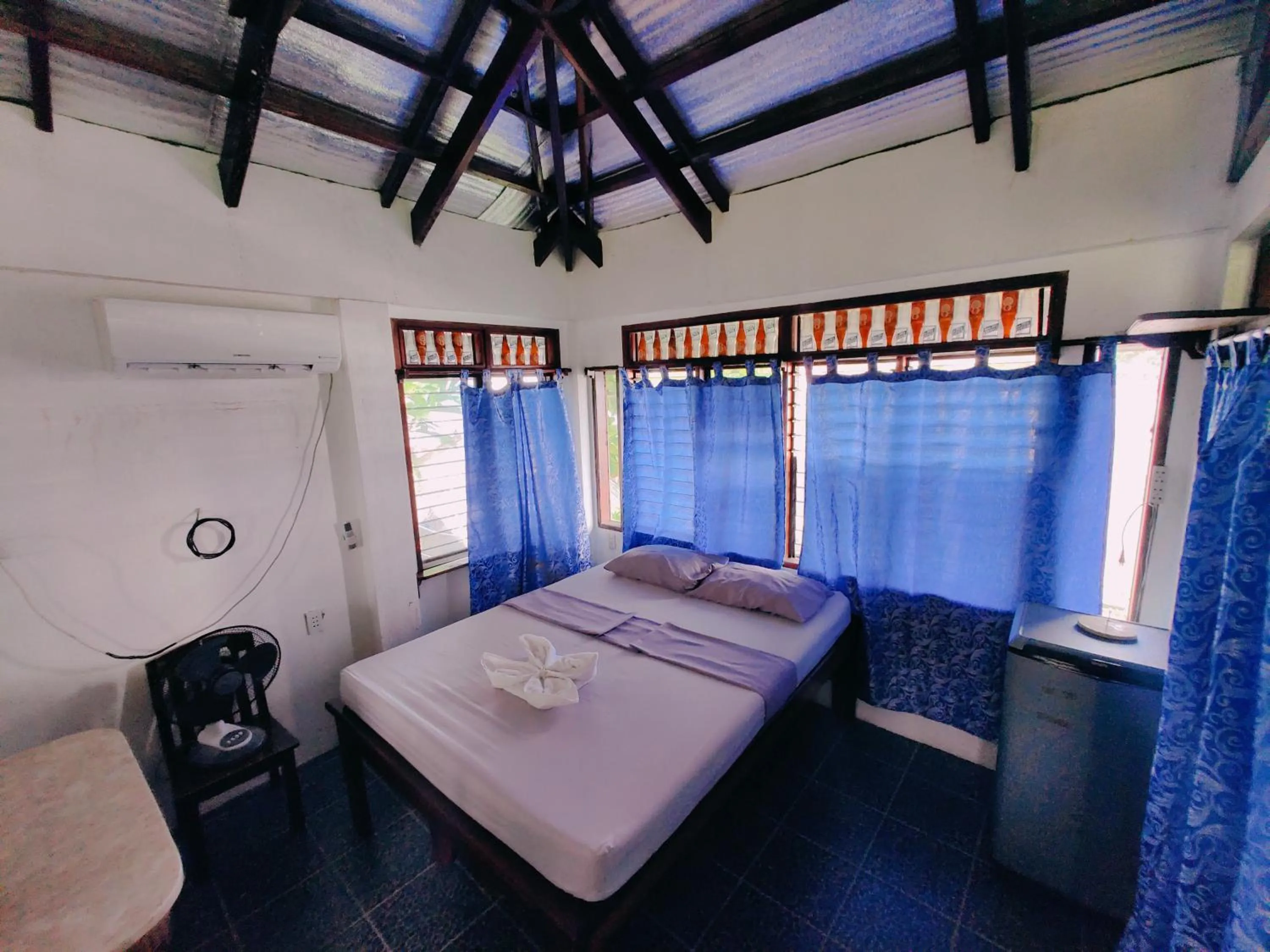 Bedroom, Bed in Patrick's on the Beach Resort