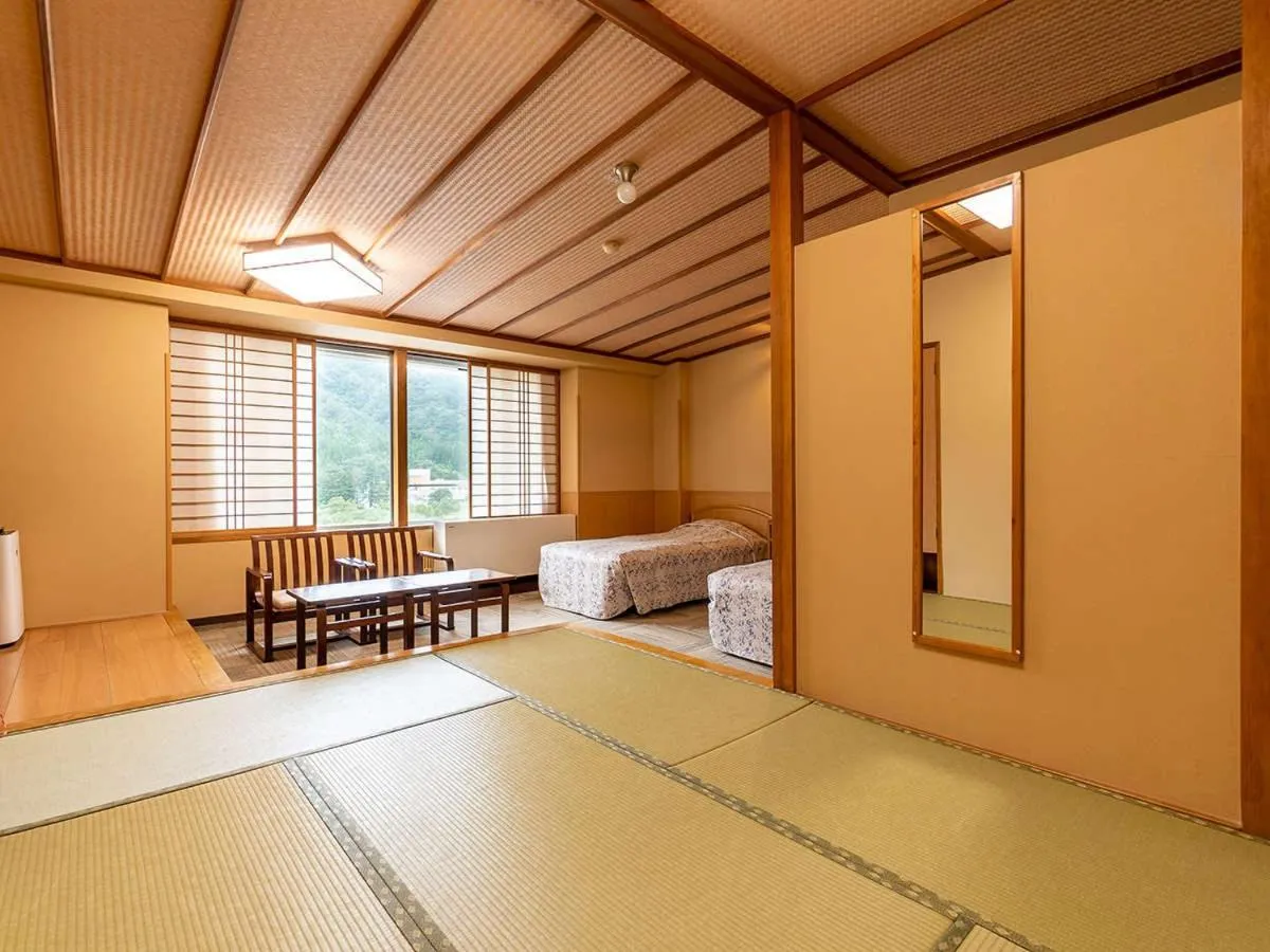 Bed in Ooedo Onsen Monogatari Kounkaku