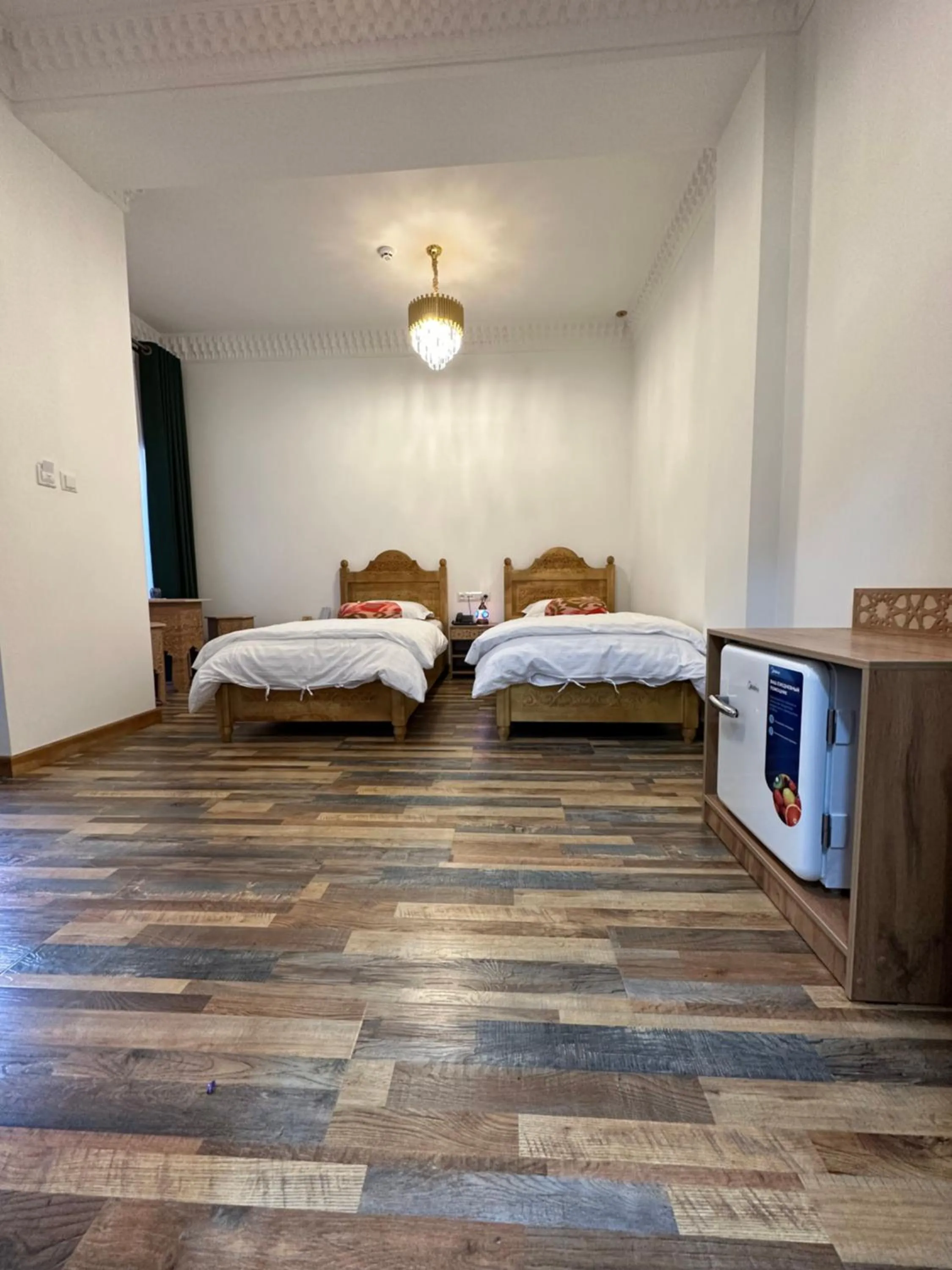 Photo of the whole room, Bed in Rizo Boutique