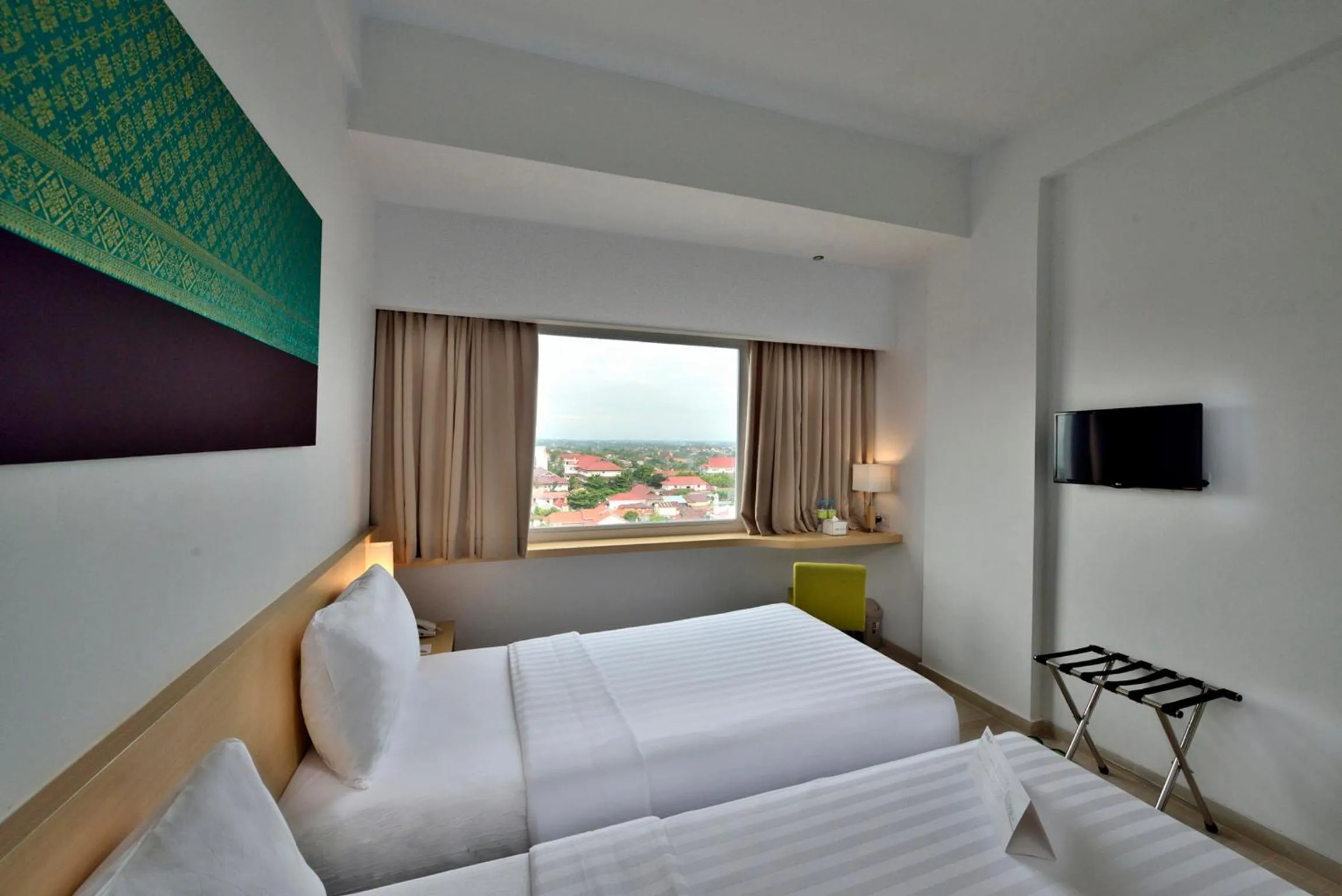 Bed in Whiz Prime Hotel Sudirman Pekanbaru