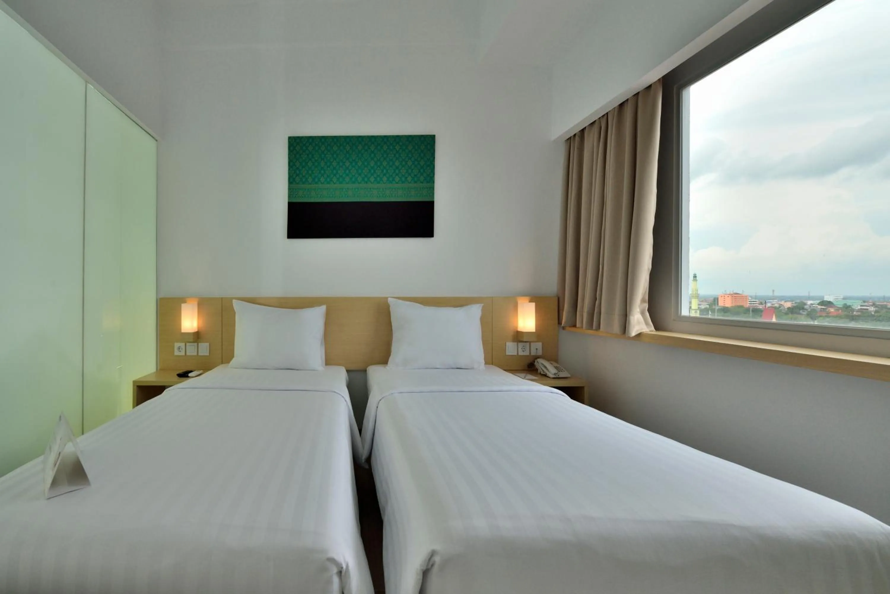 Bedroom, Bed in Whiz Prime Hotel Sudirman Pekanbaru