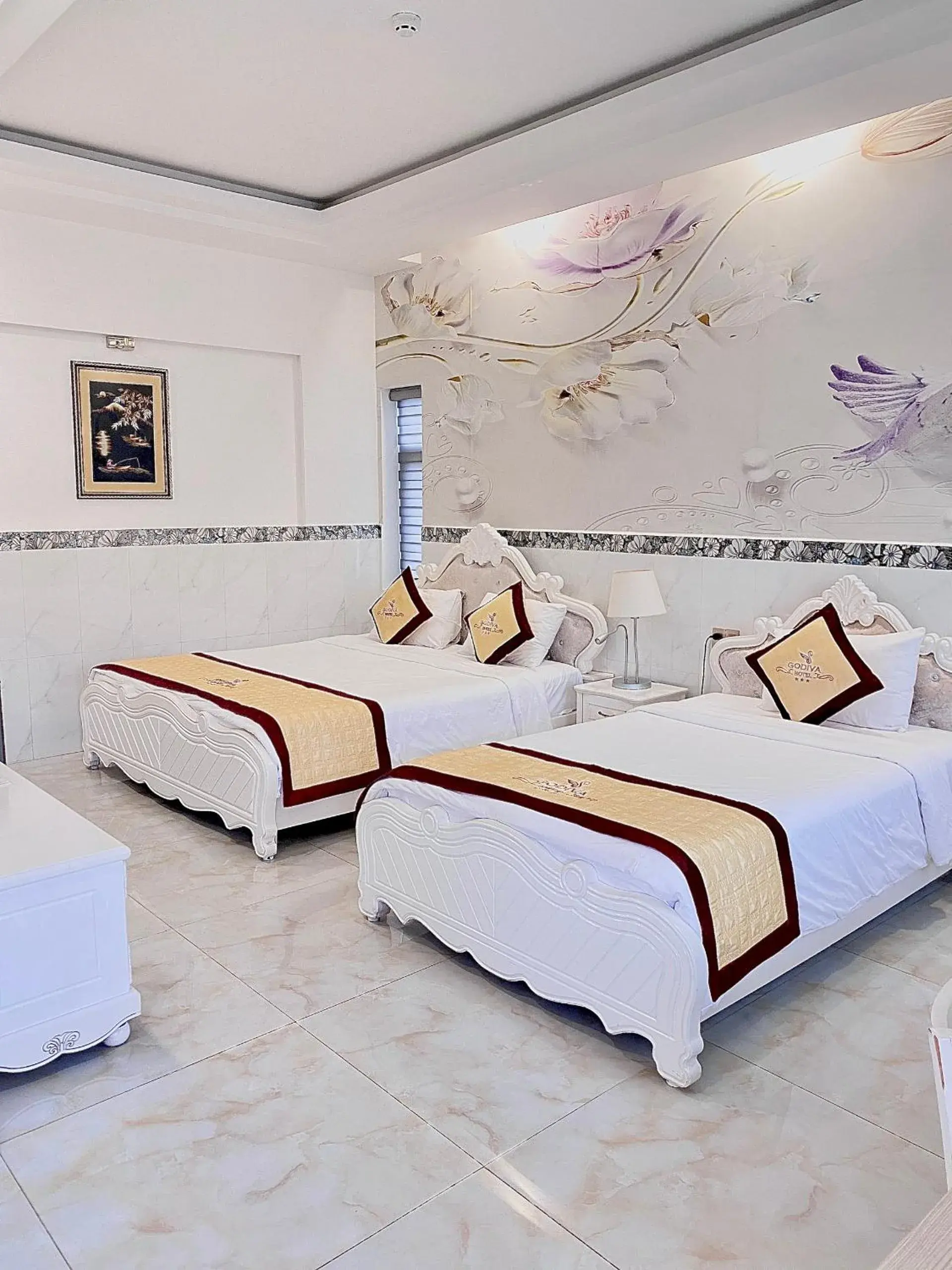 Deluxe Triple Room in Godiva Villa Phu Quoc Deluxe Triple Room in Godiva Villa Phu Quoc