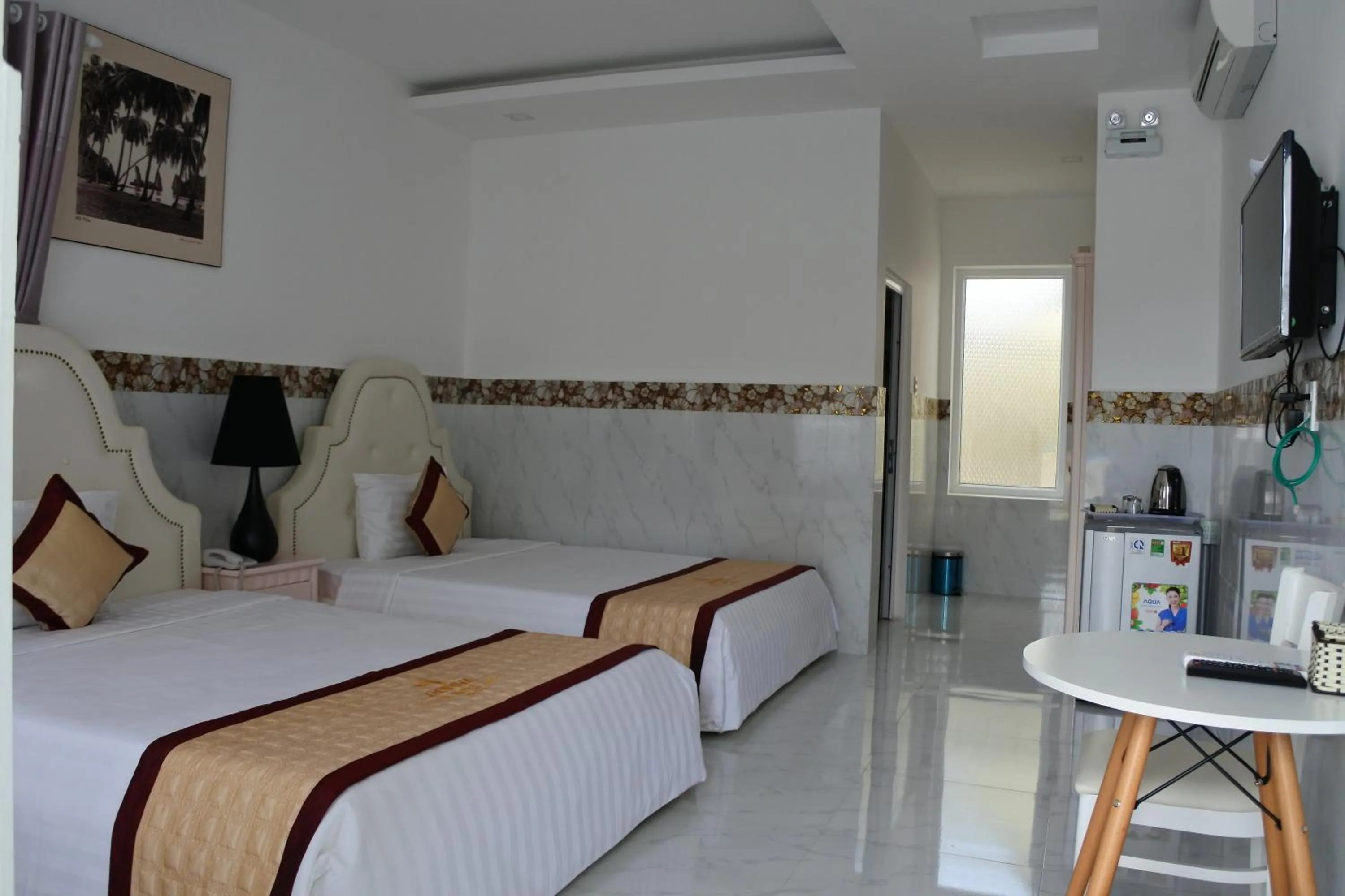Photo of the whole room, Bed in Godiva Villa Phu Quoc