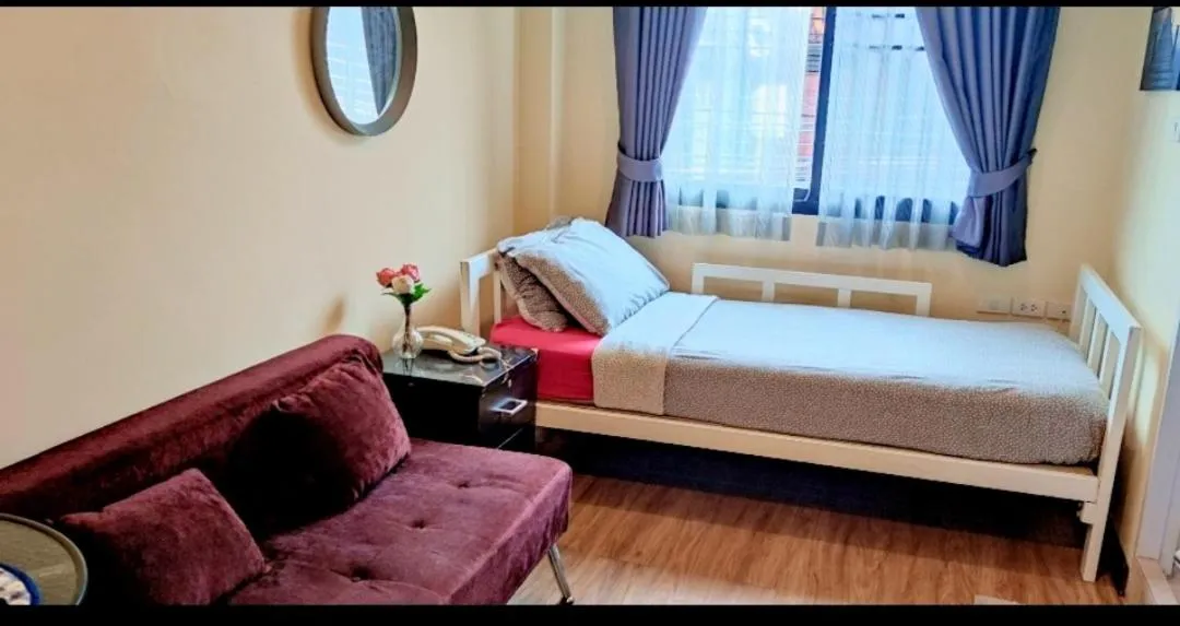 Photo of the whole room, Bed in The Cube Sathorn Boutique Hotel เดอะ คิวบ์ สาทร บูติค โฮเทล Near BTS Surasak