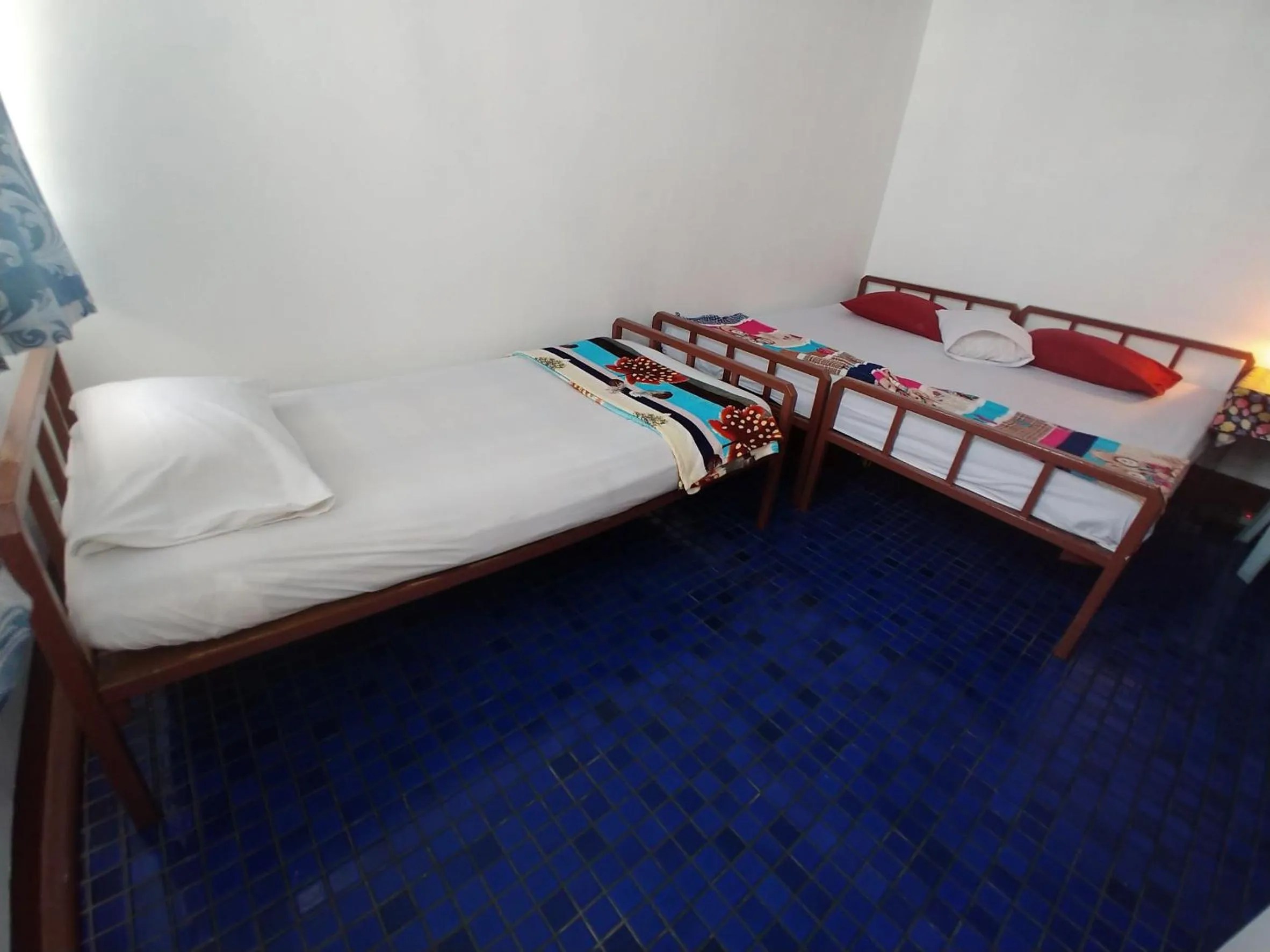 Bed in Prasuri Guest House