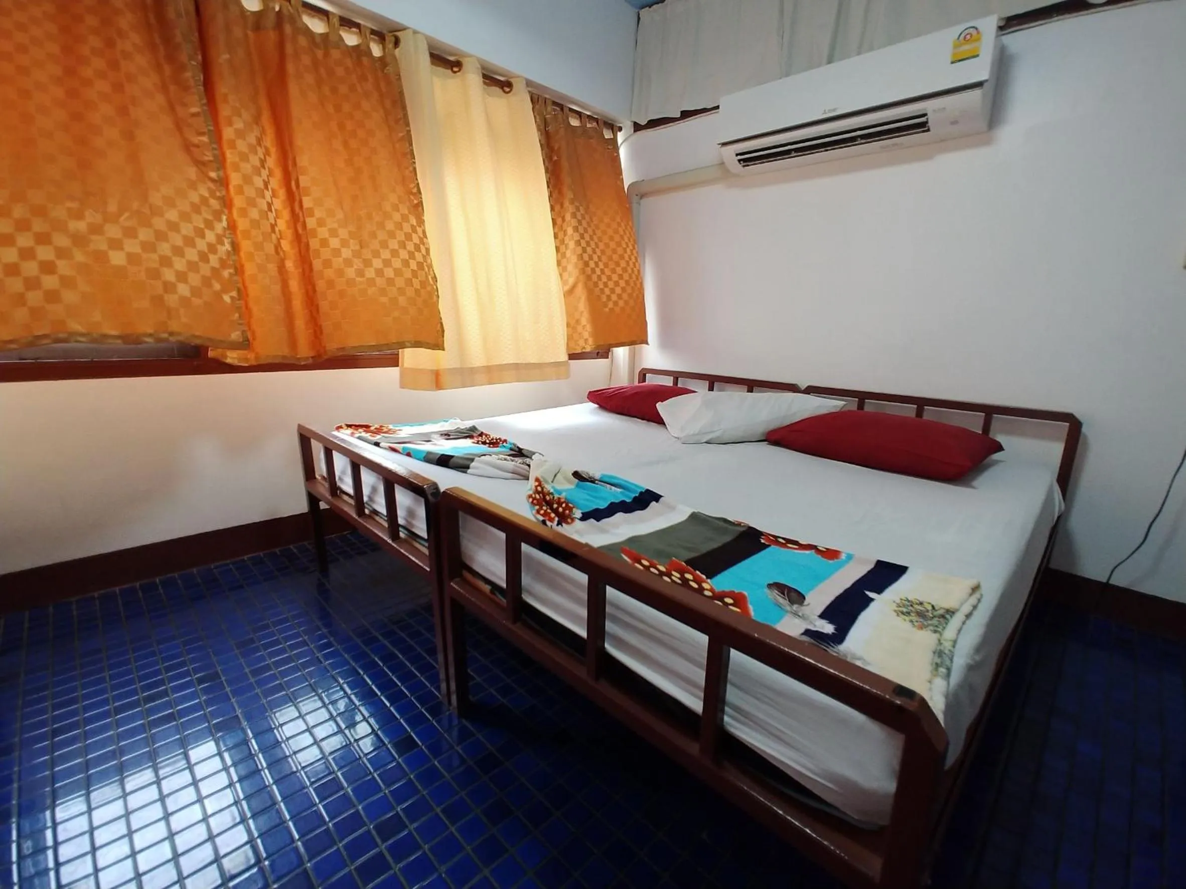 Bed in Prasuri Guest House