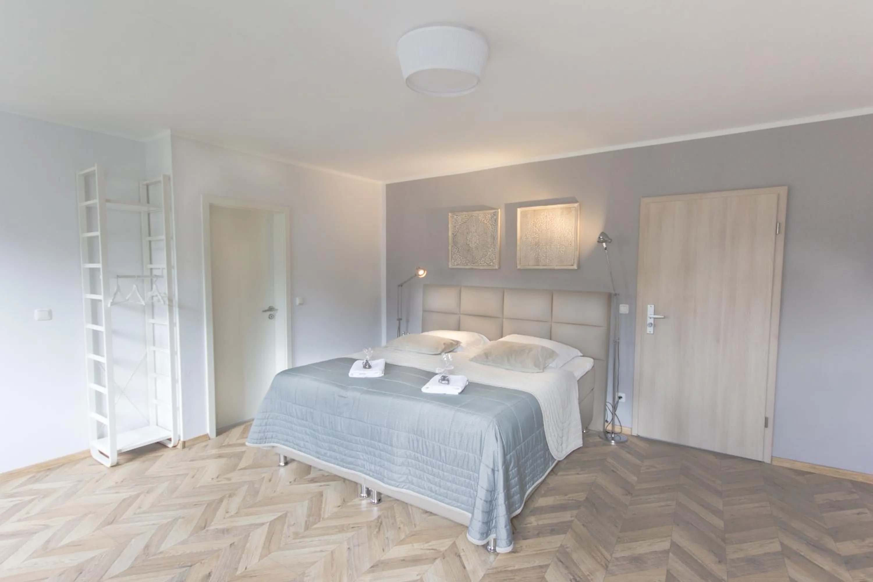 Photo of the whole room, Bed in TM Suites