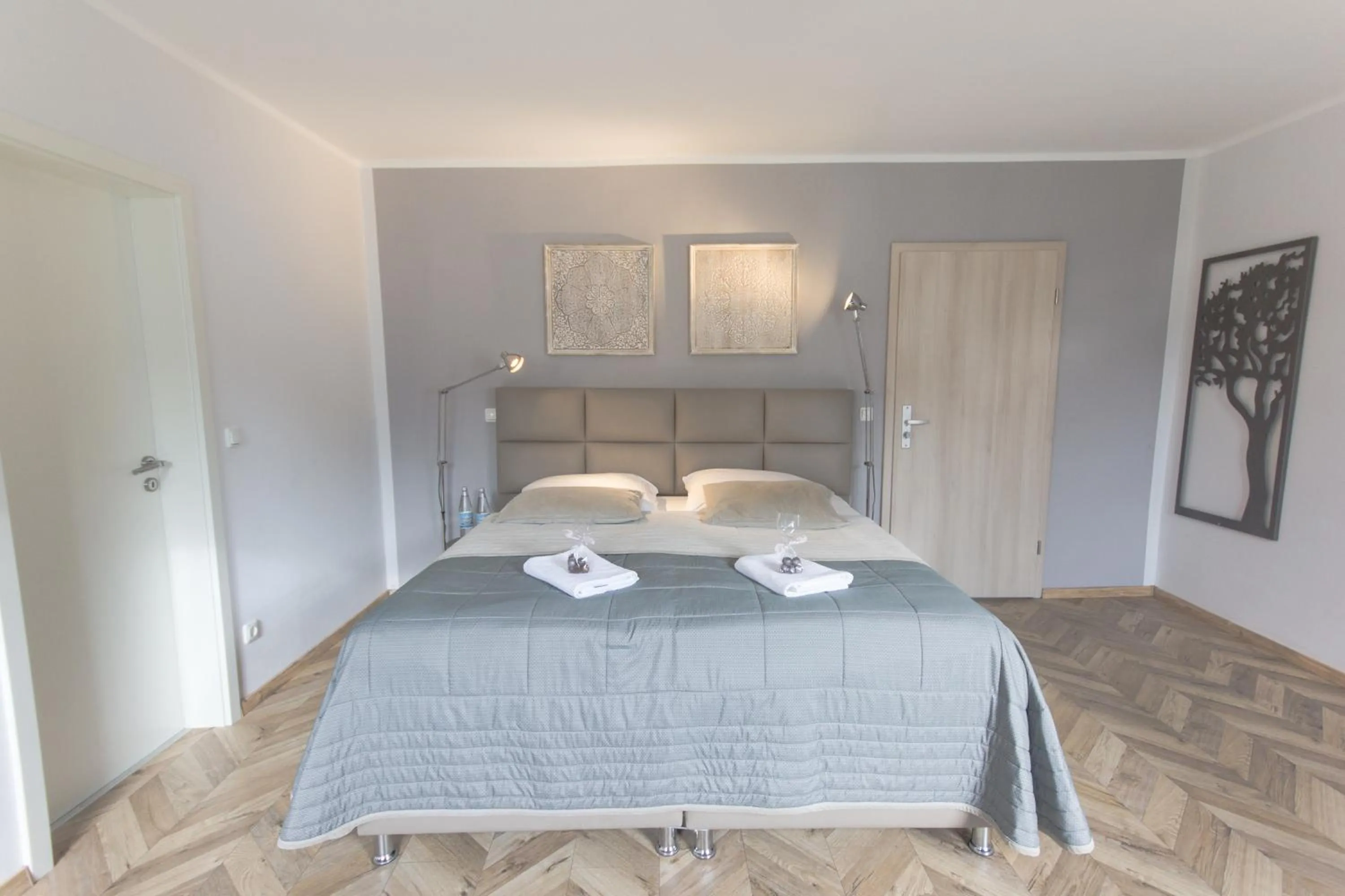 Photo of the whole room, Bed in TM Suites