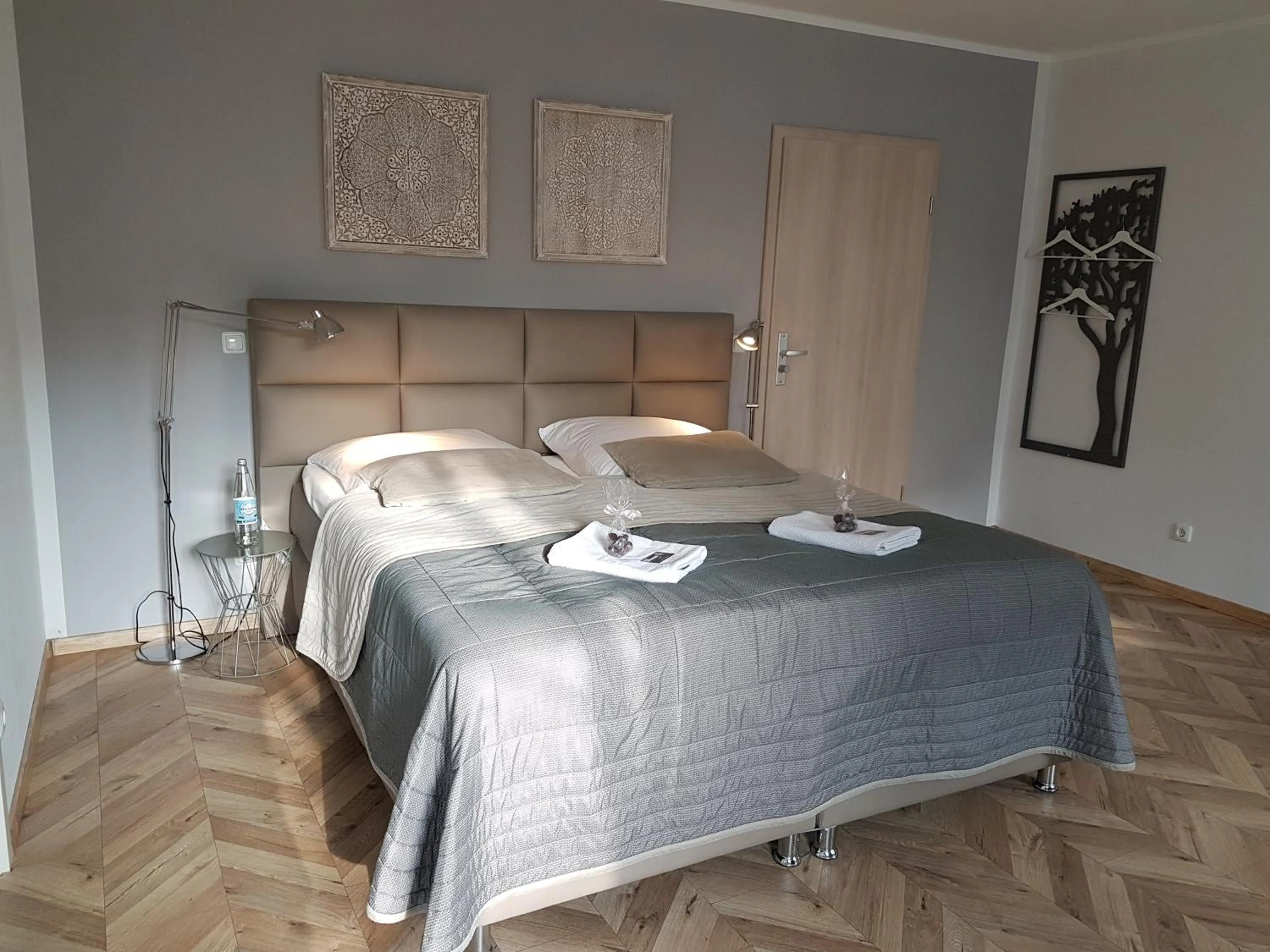 Photo of the whole room, Bed in TM Suites