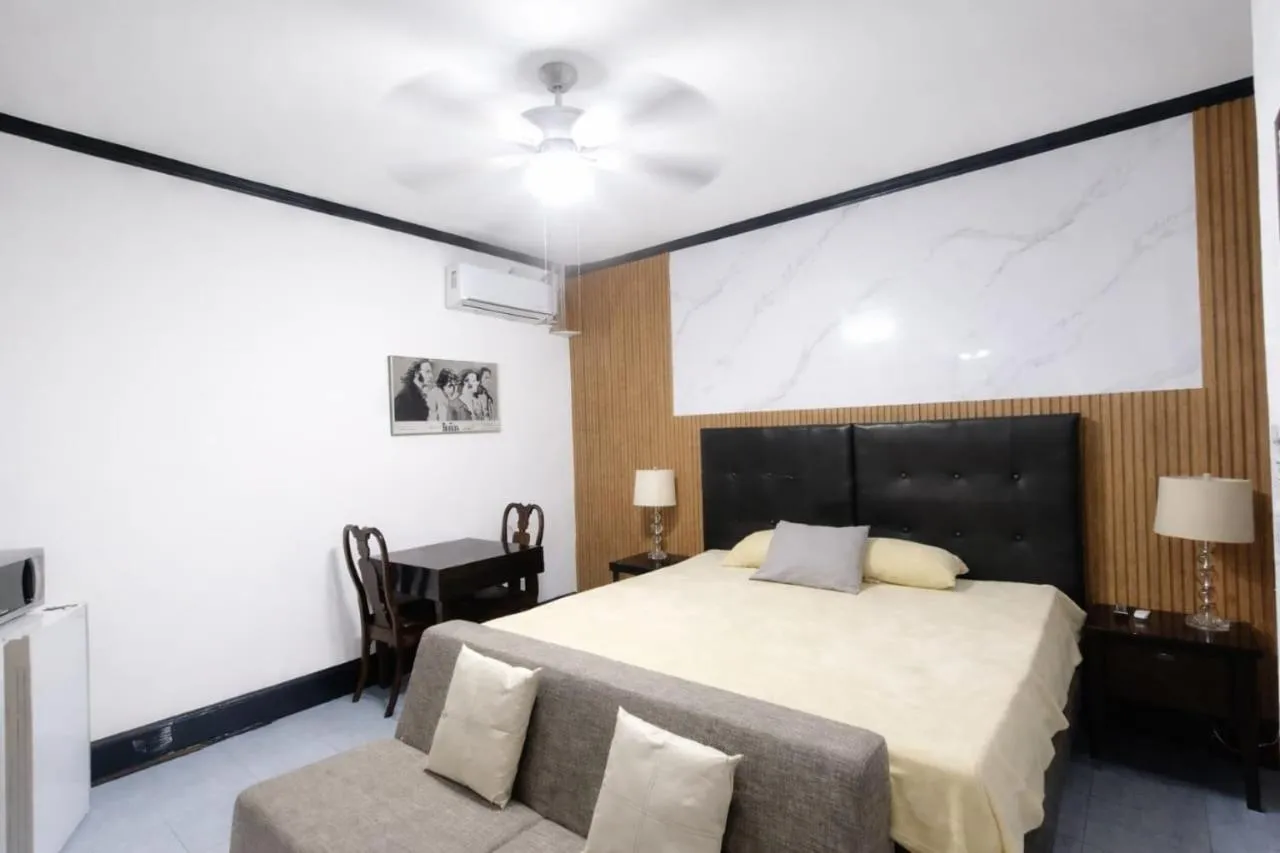 Bed in Hotel Garcias Suites, Linares