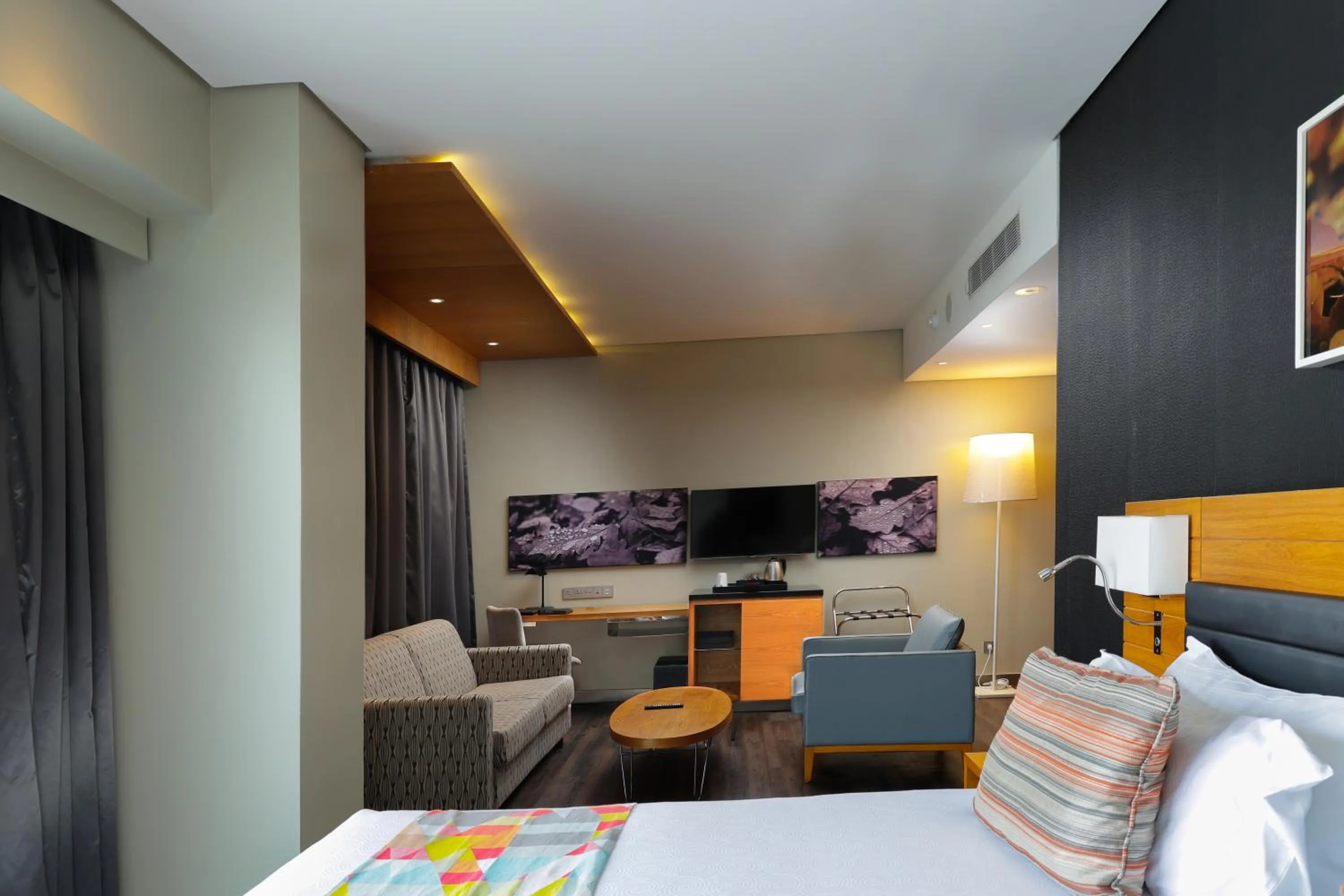 Living room, Bed in Ubumwe Grande Hotel