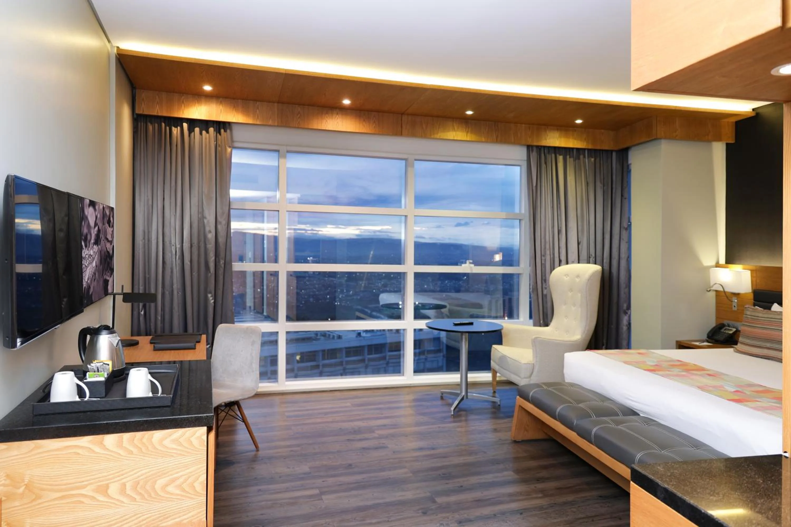 Photo of the whole room, Bed in Ubumwe Grande Hotel