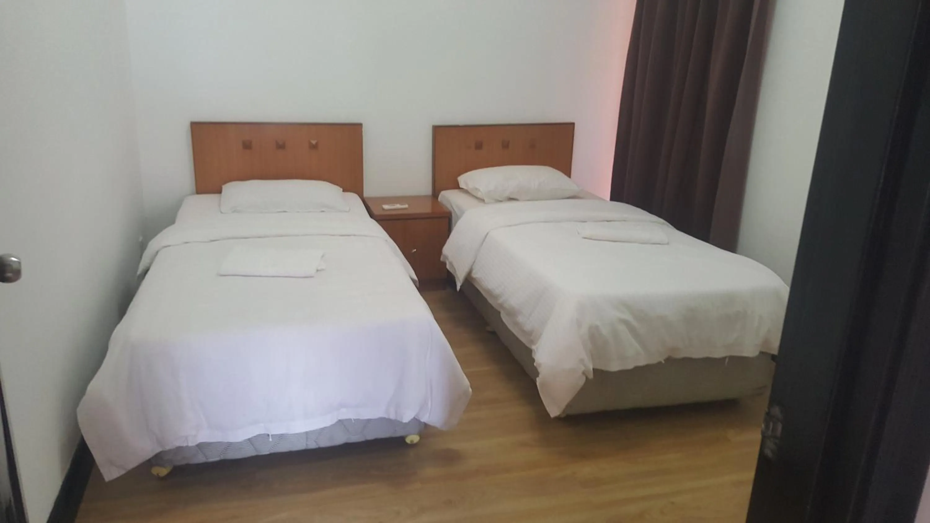 Bed in Homestay Marina Court Resort
