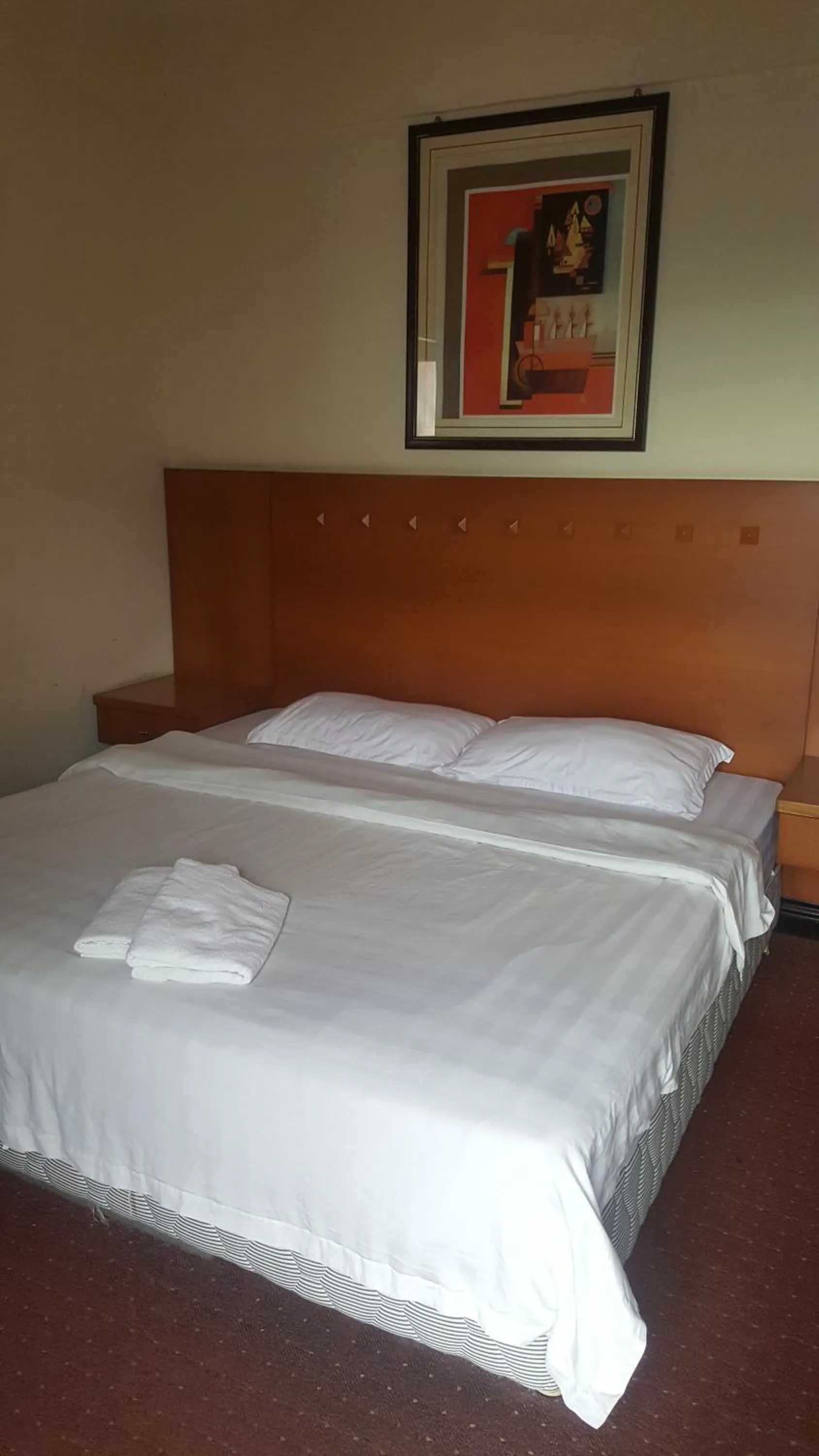 Bed in Homestay Marina Court Resort