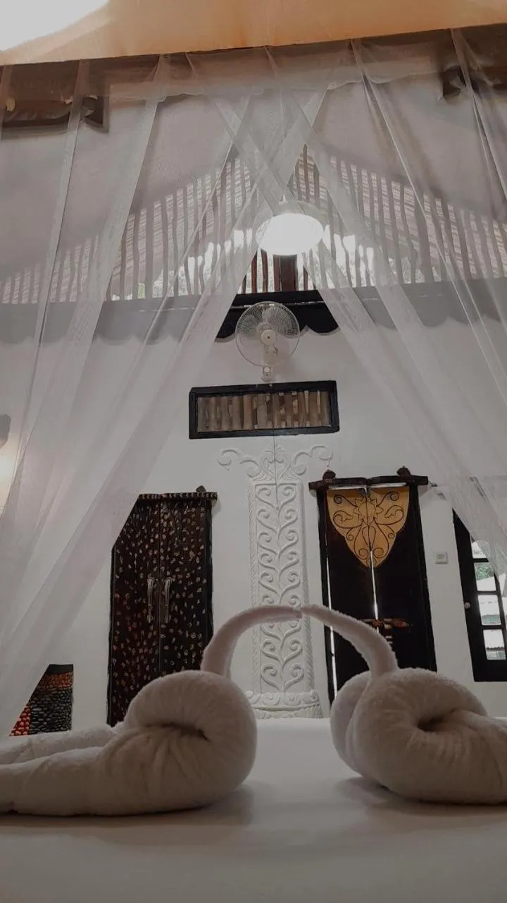 Bed in Jungle Inn Bukit lawang