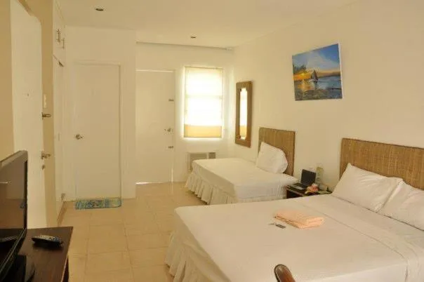 Photo of the whole room, Bed in Boracay White Coral Hotel