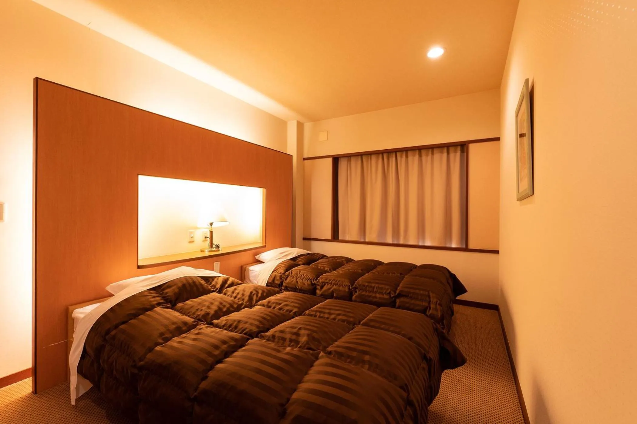 Photo of the whole room, Bed in Ooedo Onsen Monogatari Higashiyama Grand Hotel