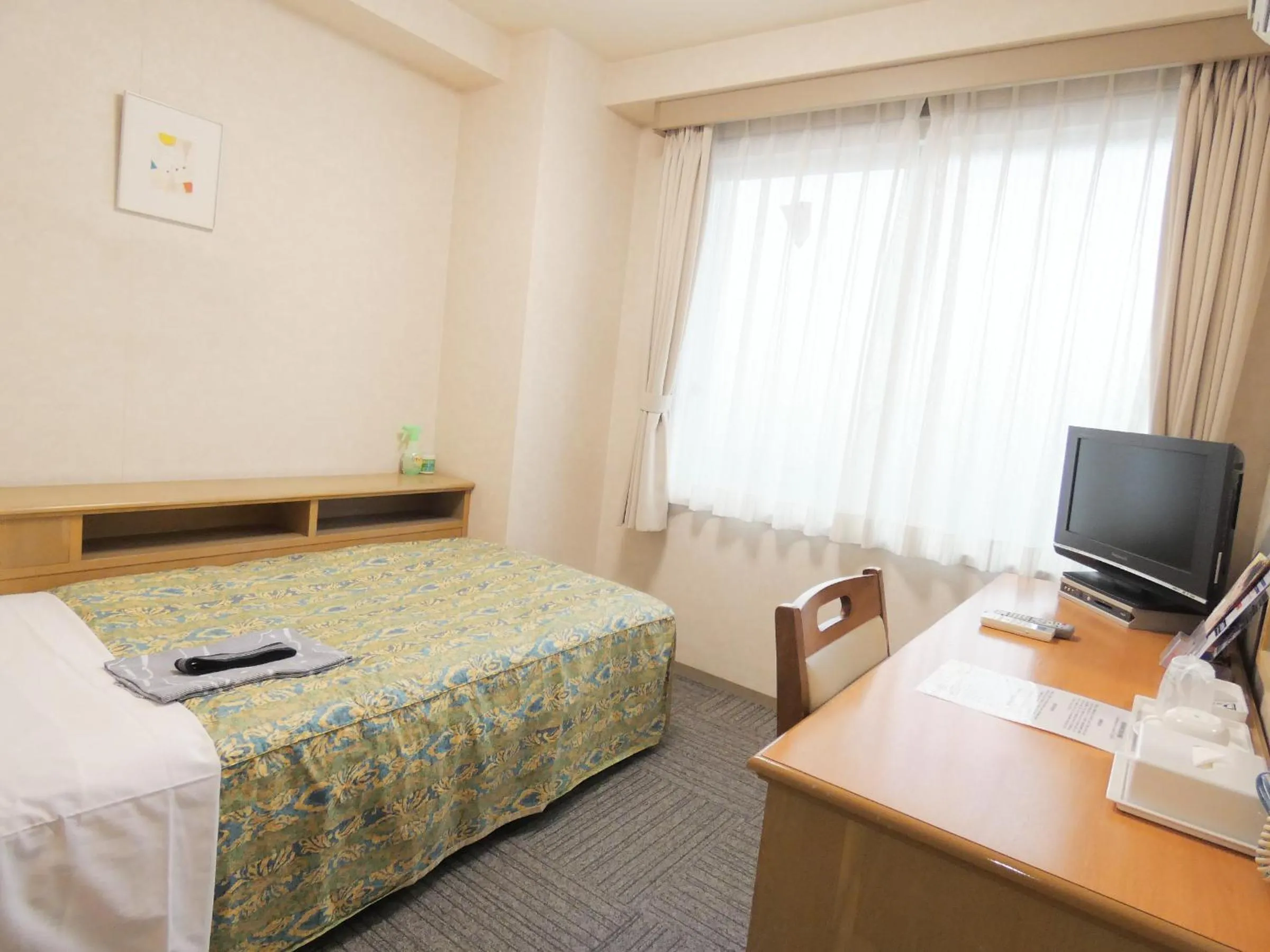 Photo of the whole room, Bed in Urban Hotel Sanko