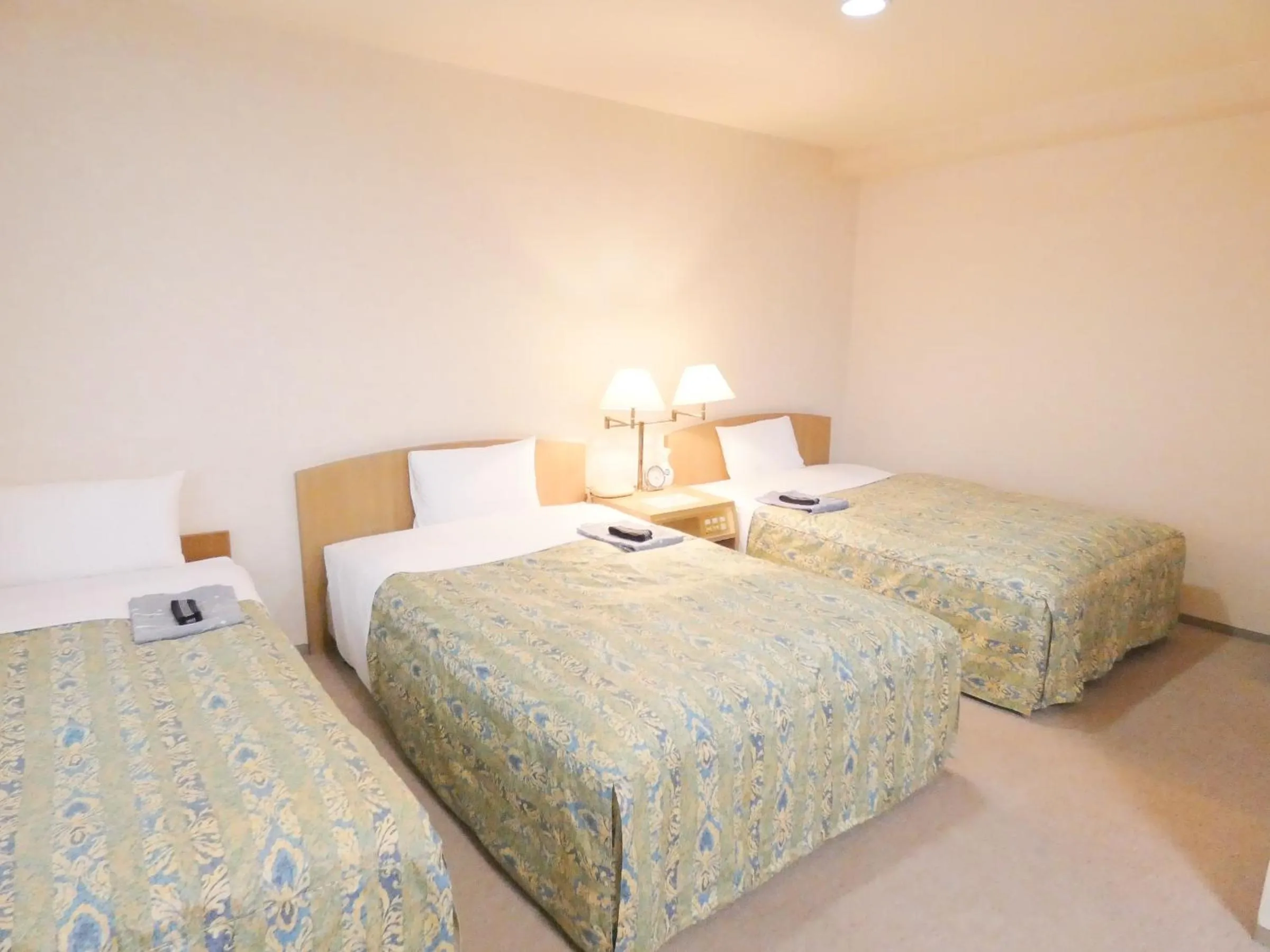 Bed in Urban Hotel Sanko