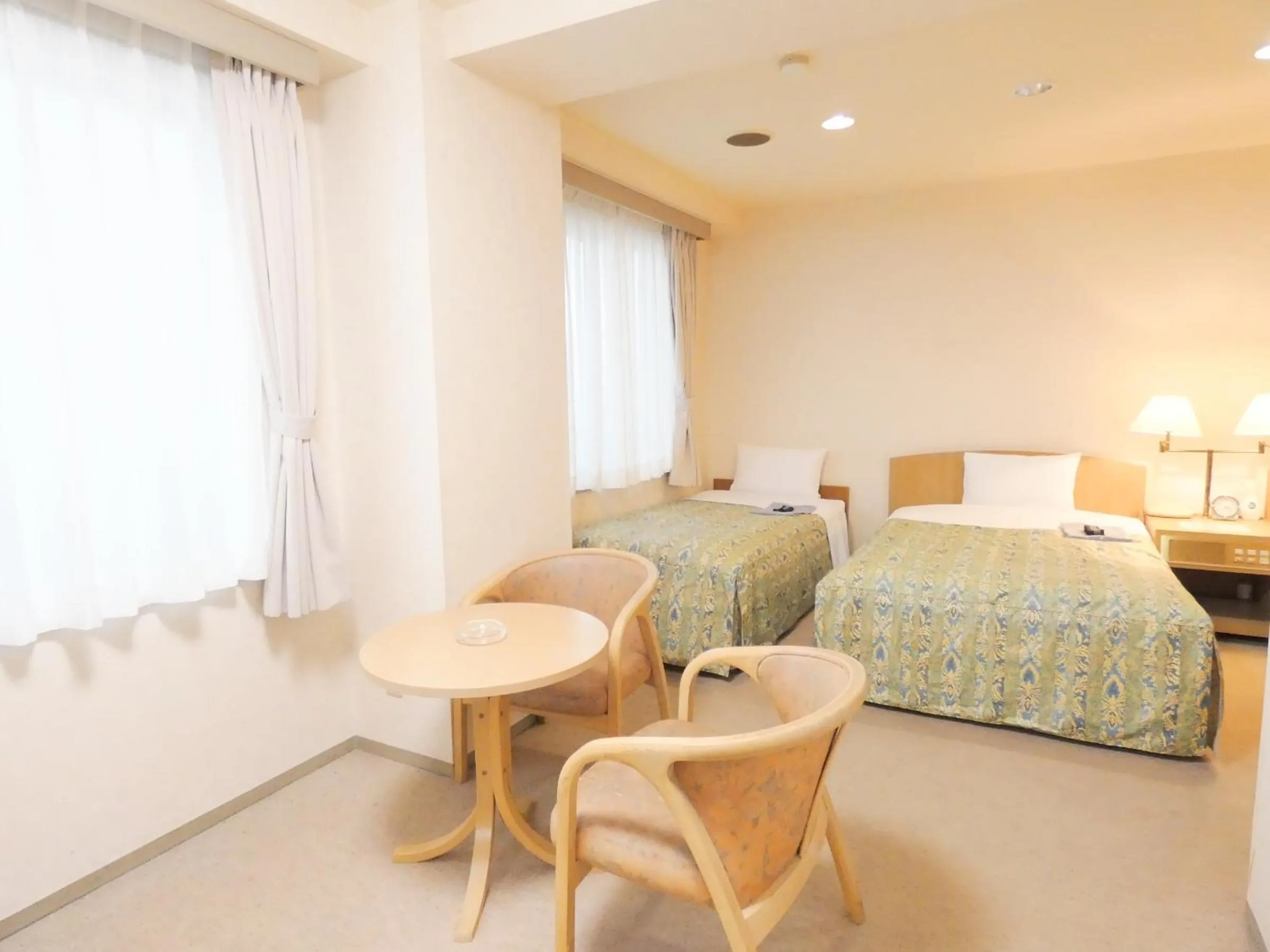 Bed in Urban Hotel Sanko