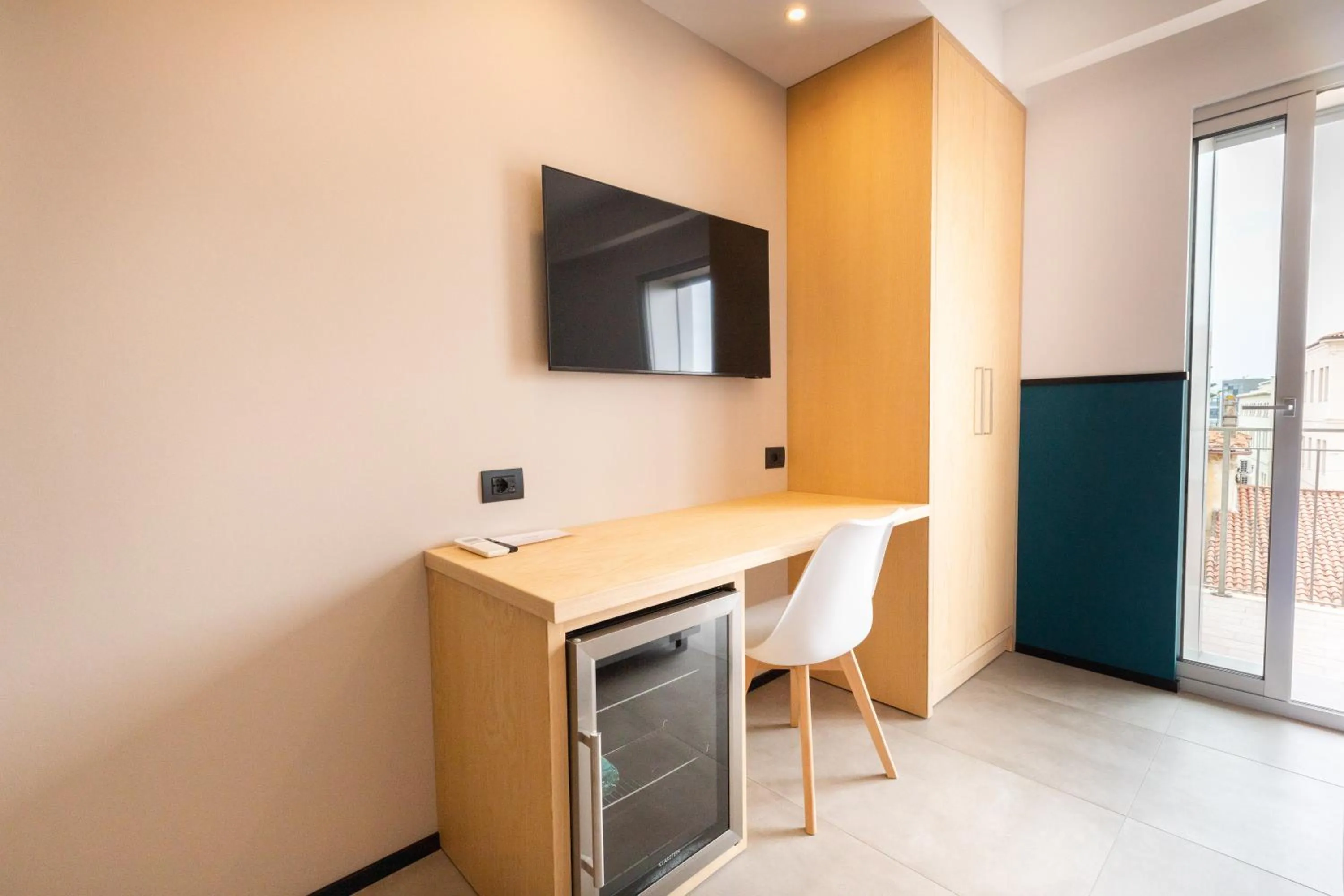 Bedroom in Antares Rooms and Suites