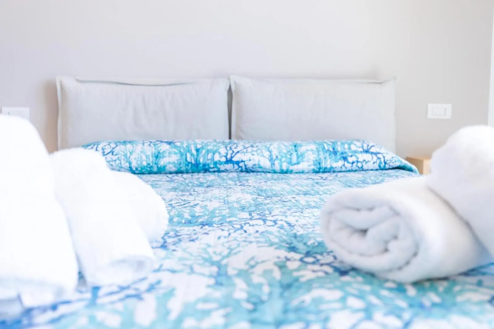 Bed in Antares Rooms and Suites