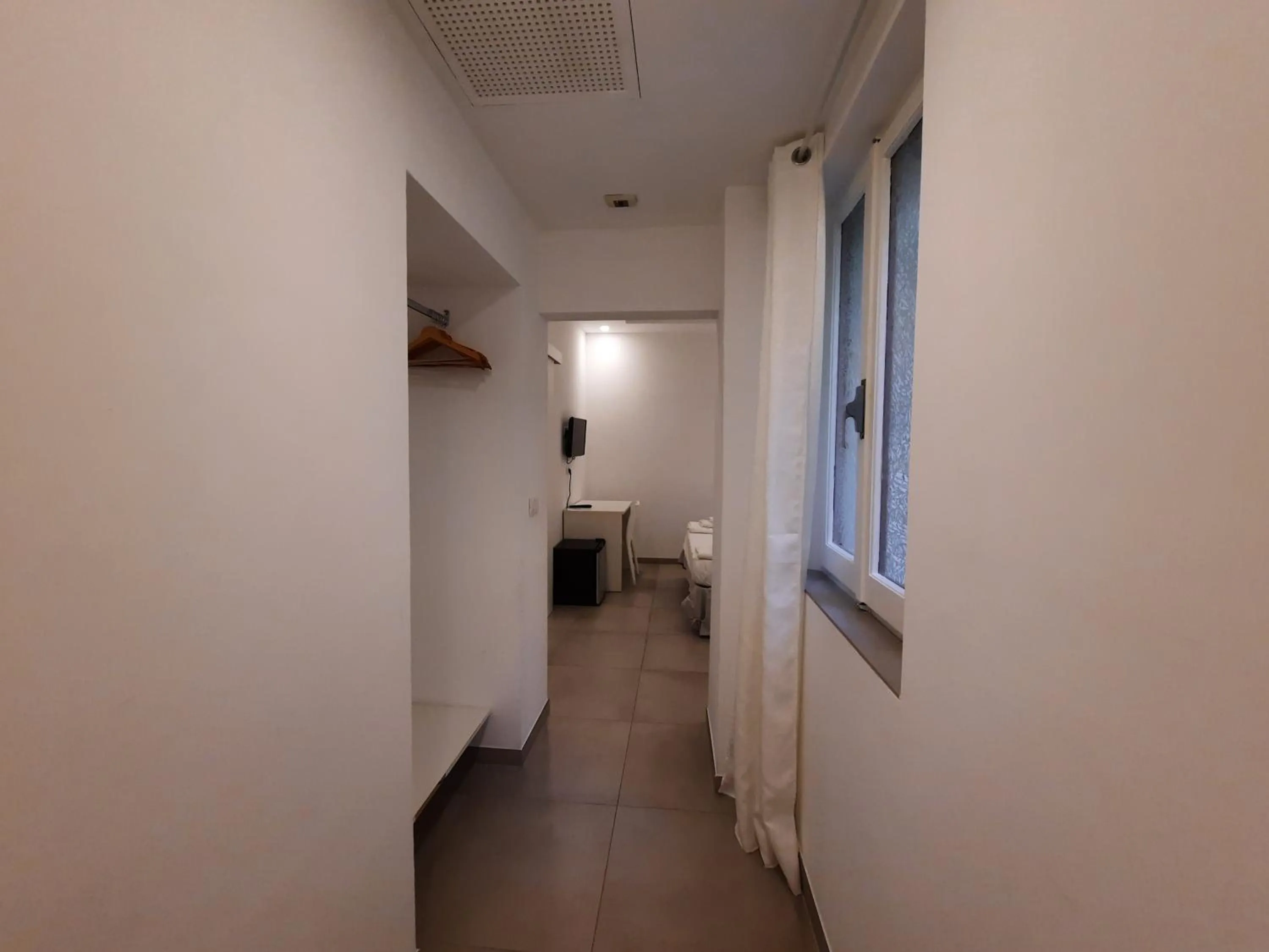 Bedroom in Antares Rooms and Suites