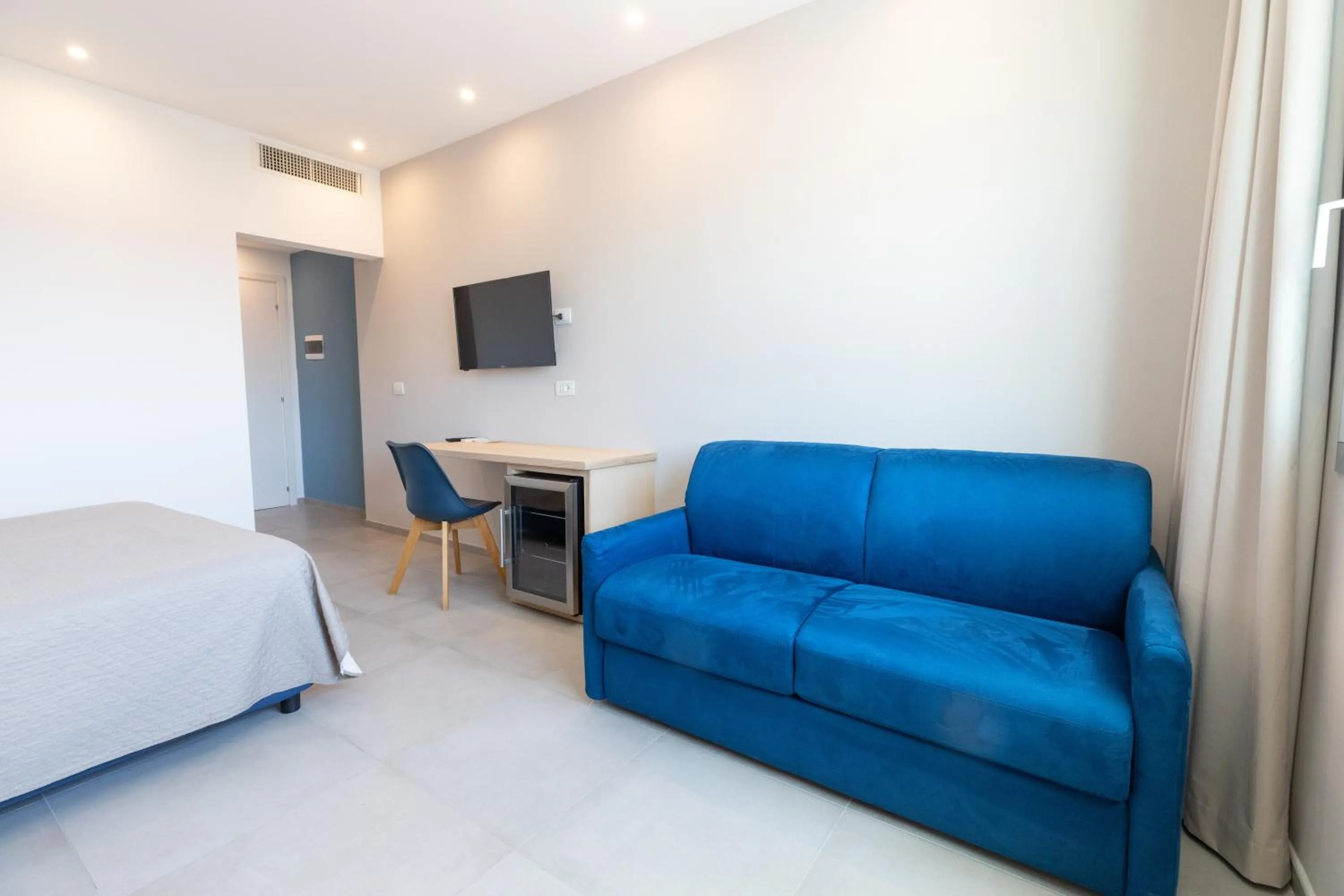 Bedroom in Antares Rooms and Suites