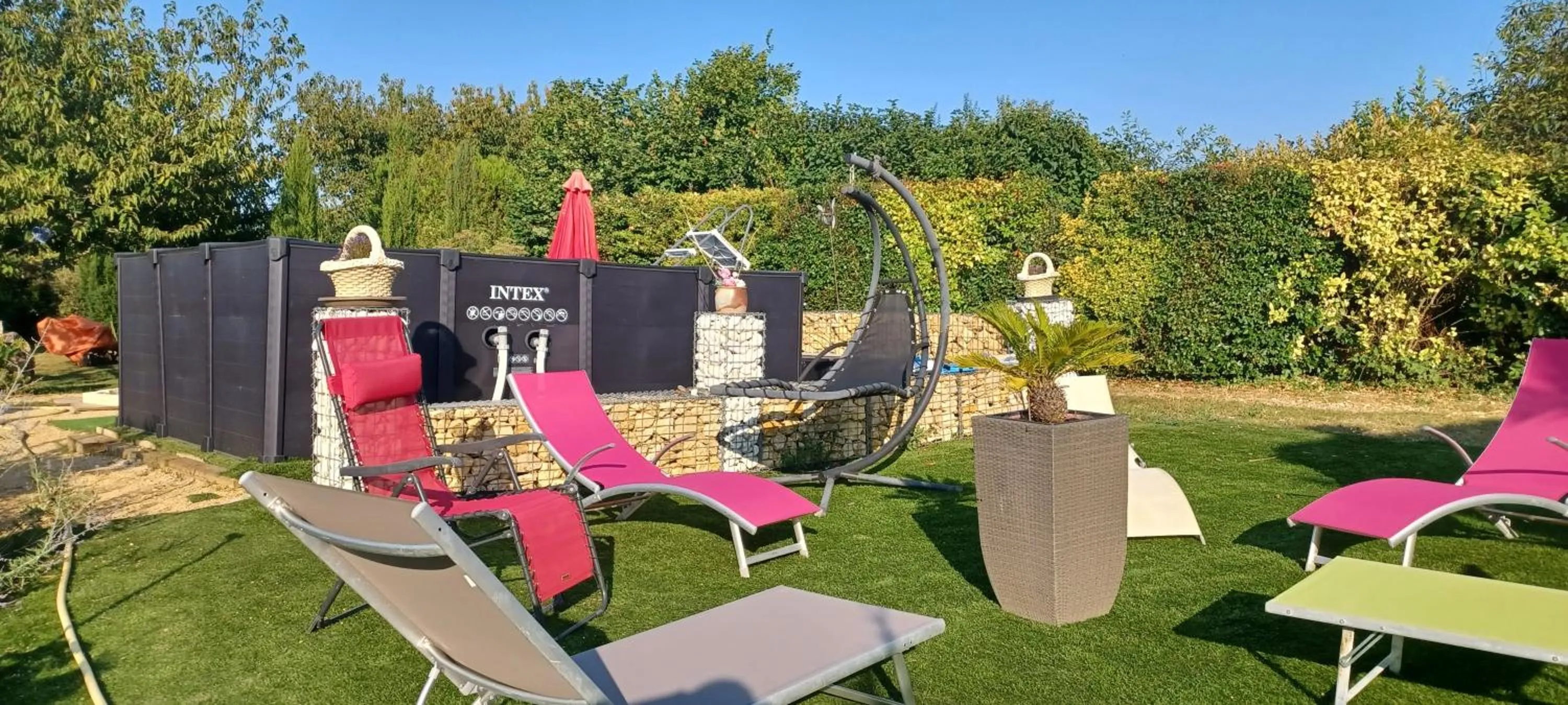 Swimming pool in Chambre d'Hôtes Les Orchidées FUTUROSCOPE CHASSENEUIL POITIERS