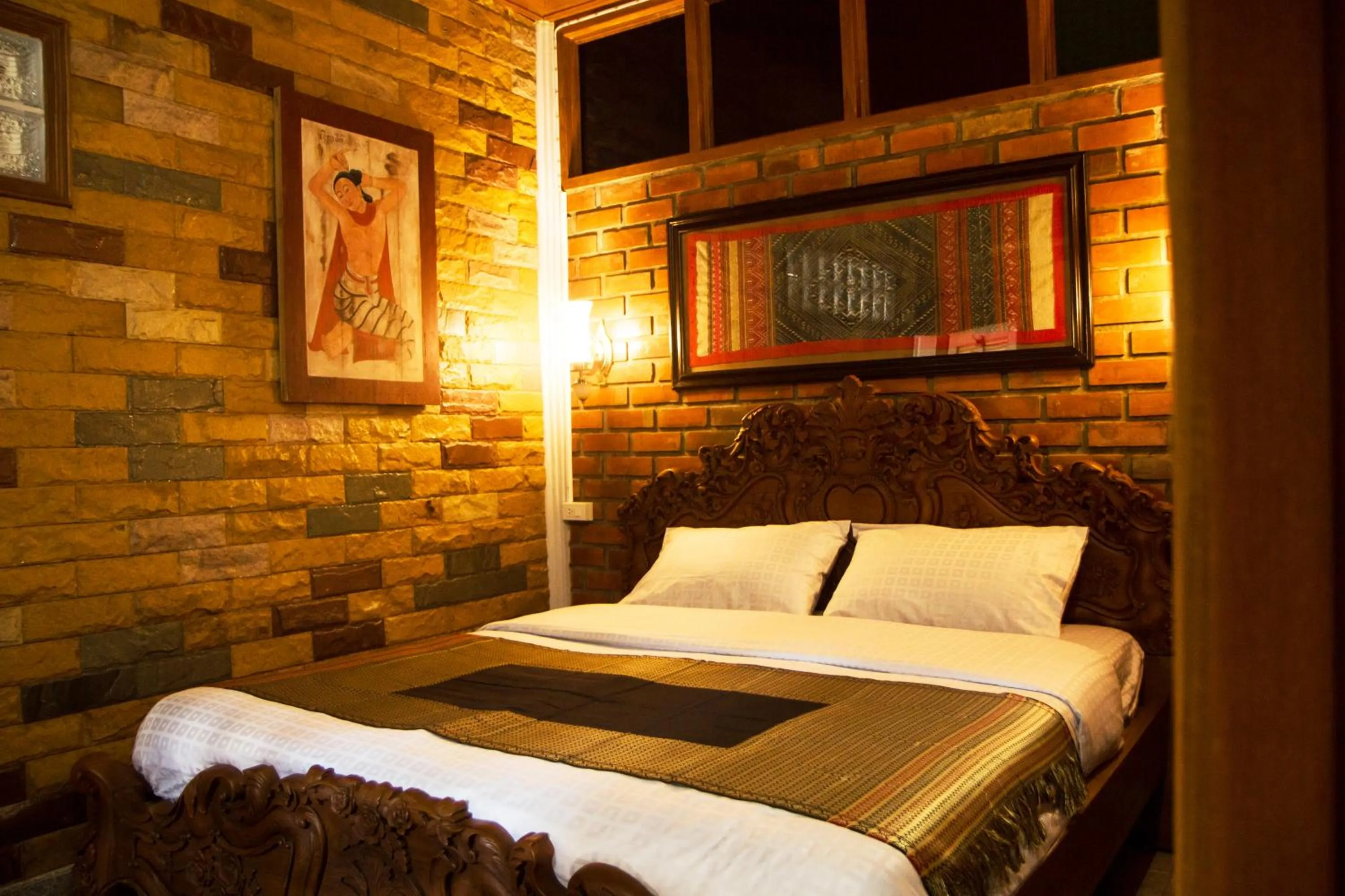 Bed in Baanthep Antique Homestay