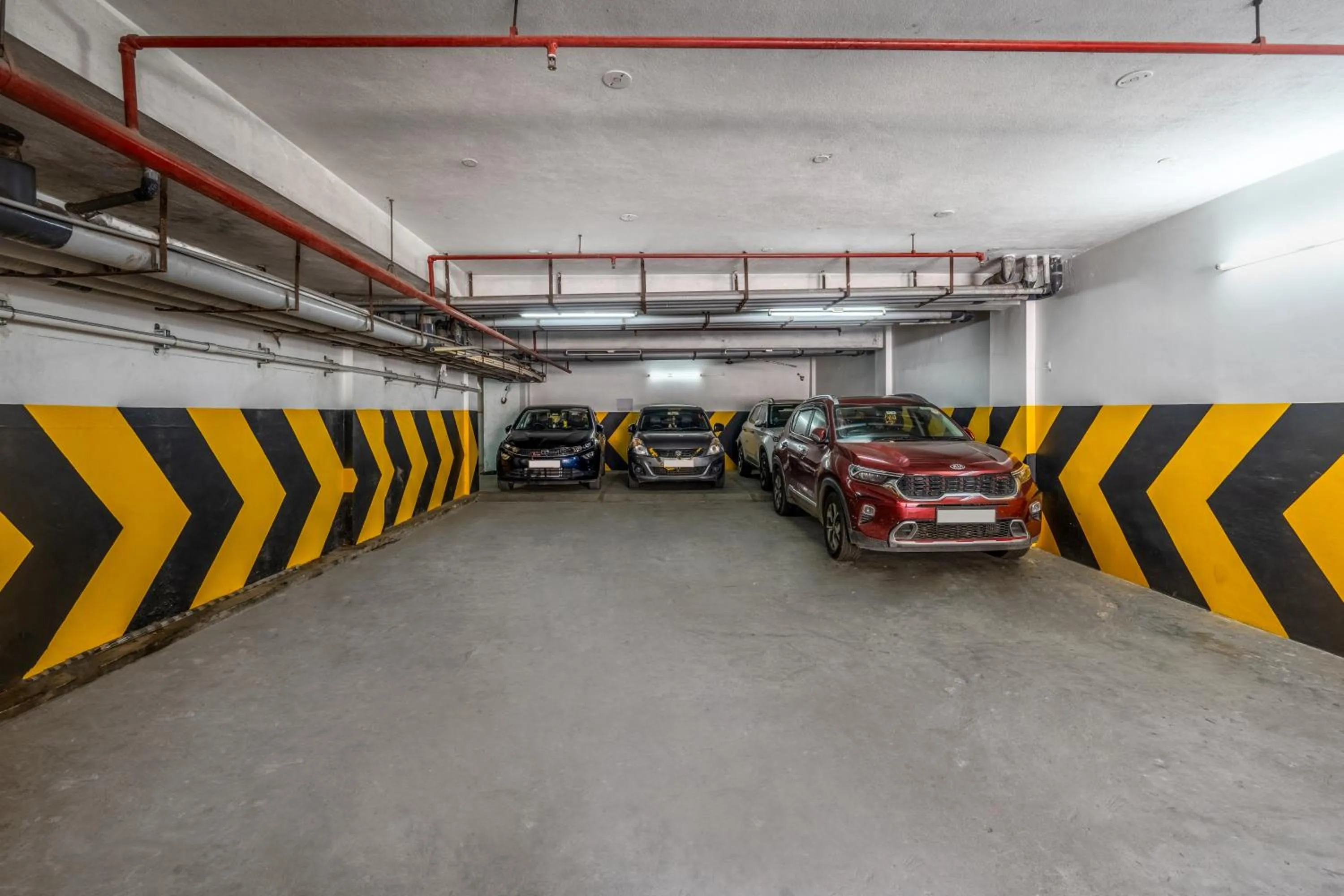 Parking in Treebo Grace Inn, 3 Min Walk From Promenade Beach