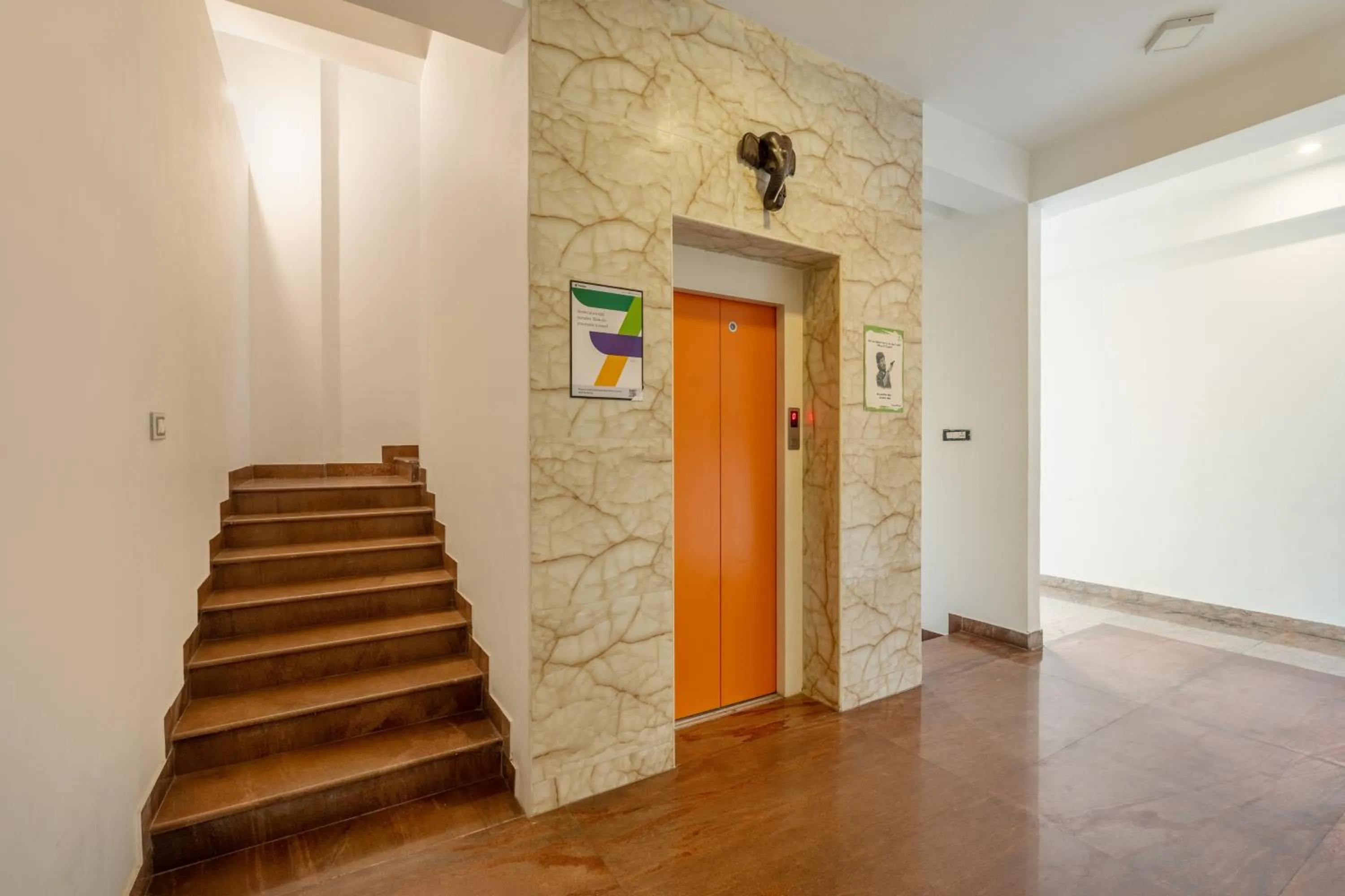 elevator in Treebo Grace Inn, 3 Min Walk From Promenade Beach